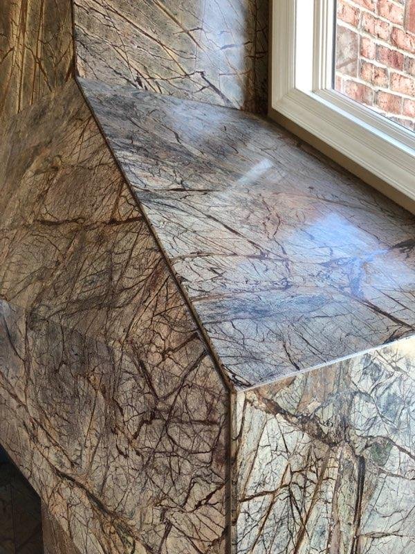 Residential fireplace finish by Custom Artisan Finishes in Omaha, Nebraska 