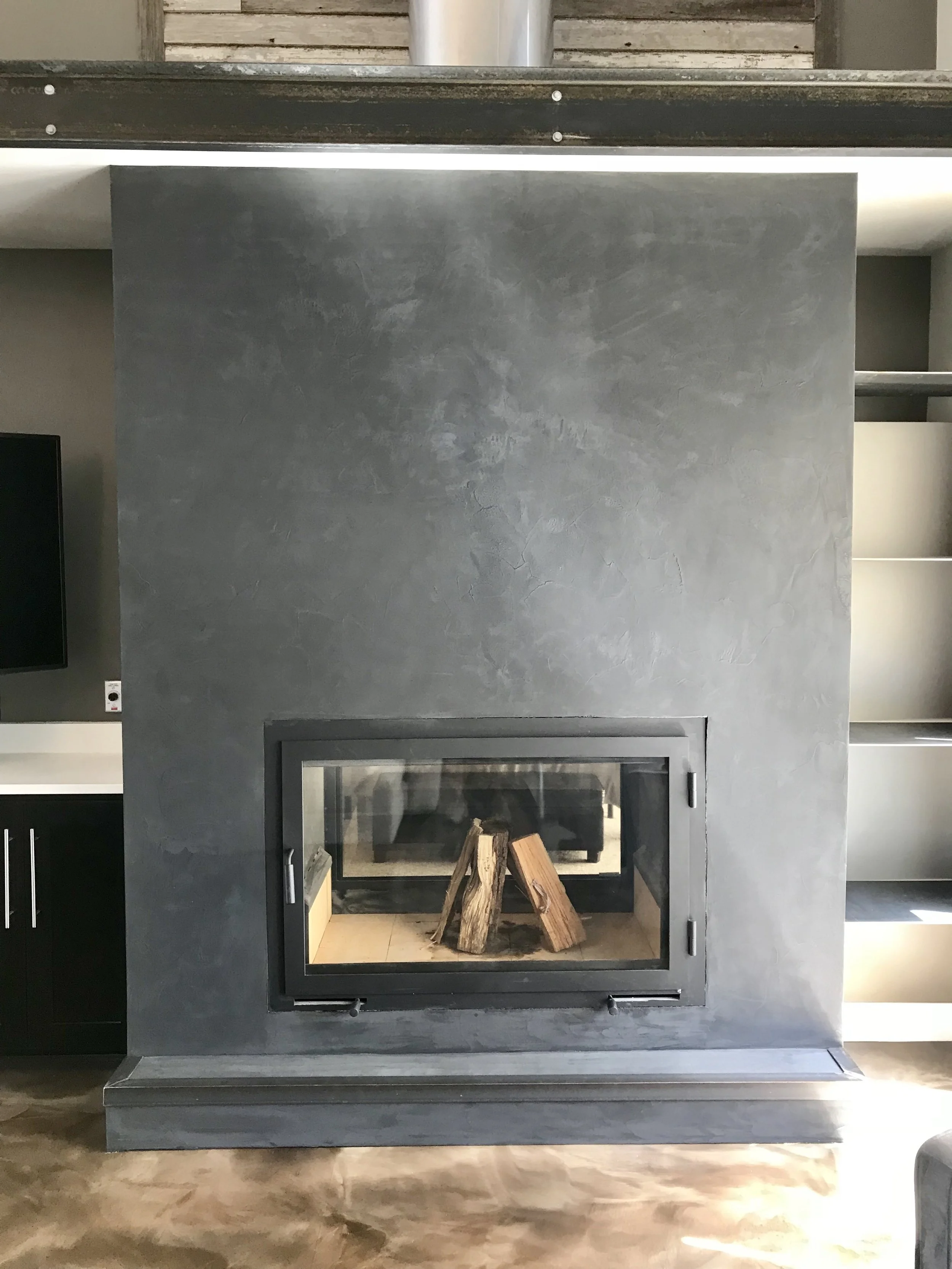 Residential fireplace finish by Custom Artisan Finishes in Omaha, Nebraska 