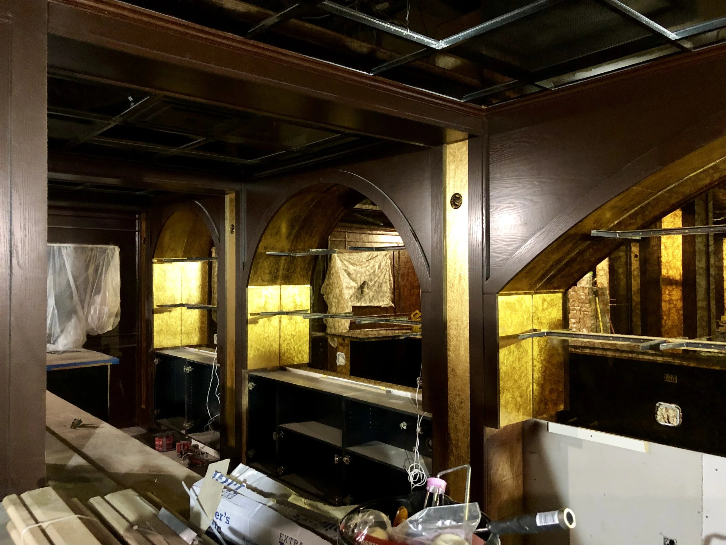 Wicked Rabbit and Alice Lounges commercial installation by Custom Artisan Finishes in Omaha, Nebraska. Commercial Restoration and Installation, gold leafing, gilding, masonry repair, by Custom Artisan Finishes in Omaha, Nebraska.