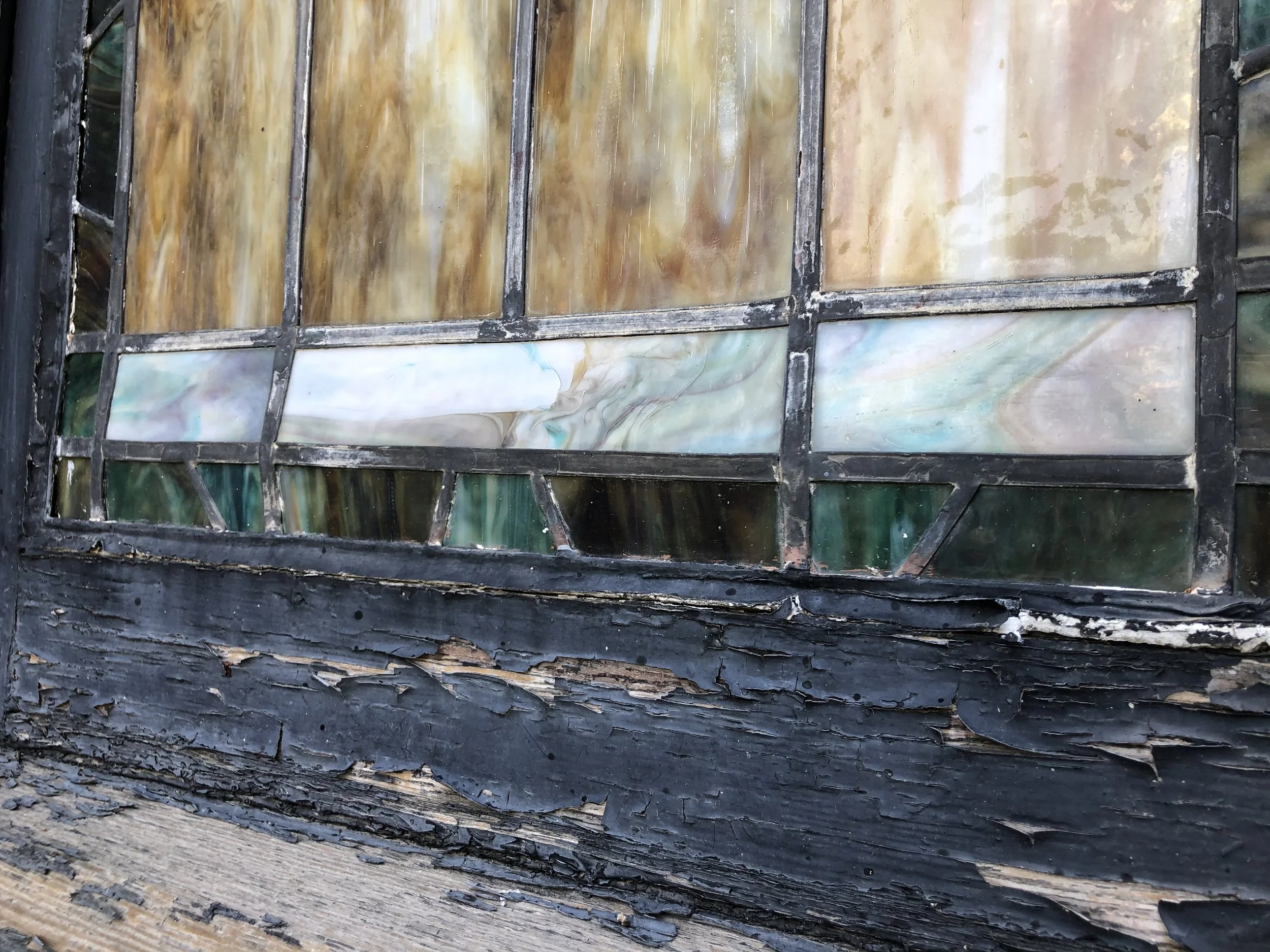 St. Francis stained glass window repair. Historical restoration by Custom Artisan Finishes in Omaha, Nebraska.