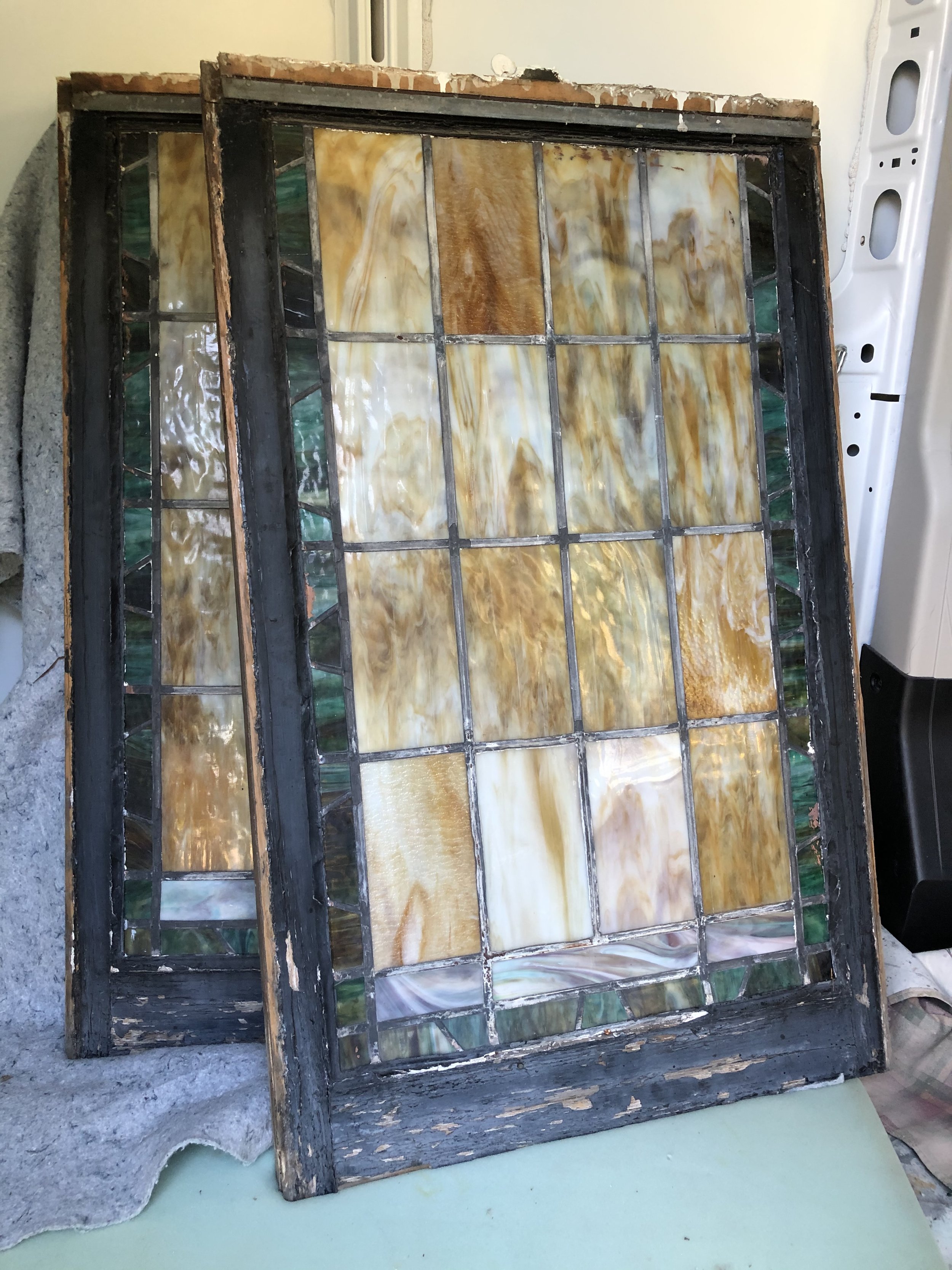 St. Francis stained glass window repair. Historical restoration by Custom Artisan Finishes in Omaha, Nebraska.