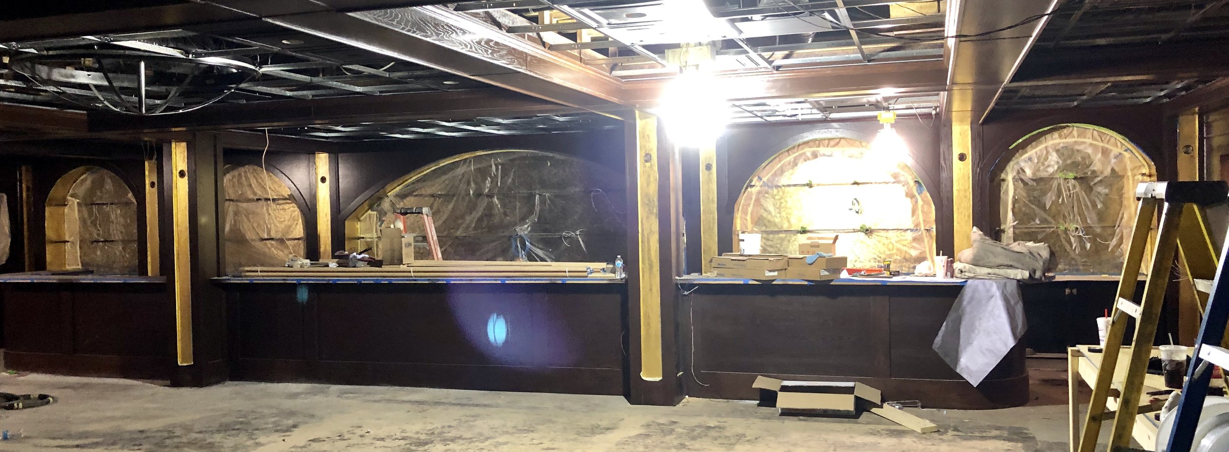 Wicked Rabbit and Alice Lounges commercial installation by Custom Artisan Finishes in Omaha, Nebraska. Commercial Restoration and Installation, gold leafing, gilding, masonry repair, by Custom Artisan Finishes in Omaha, Nebraska.
