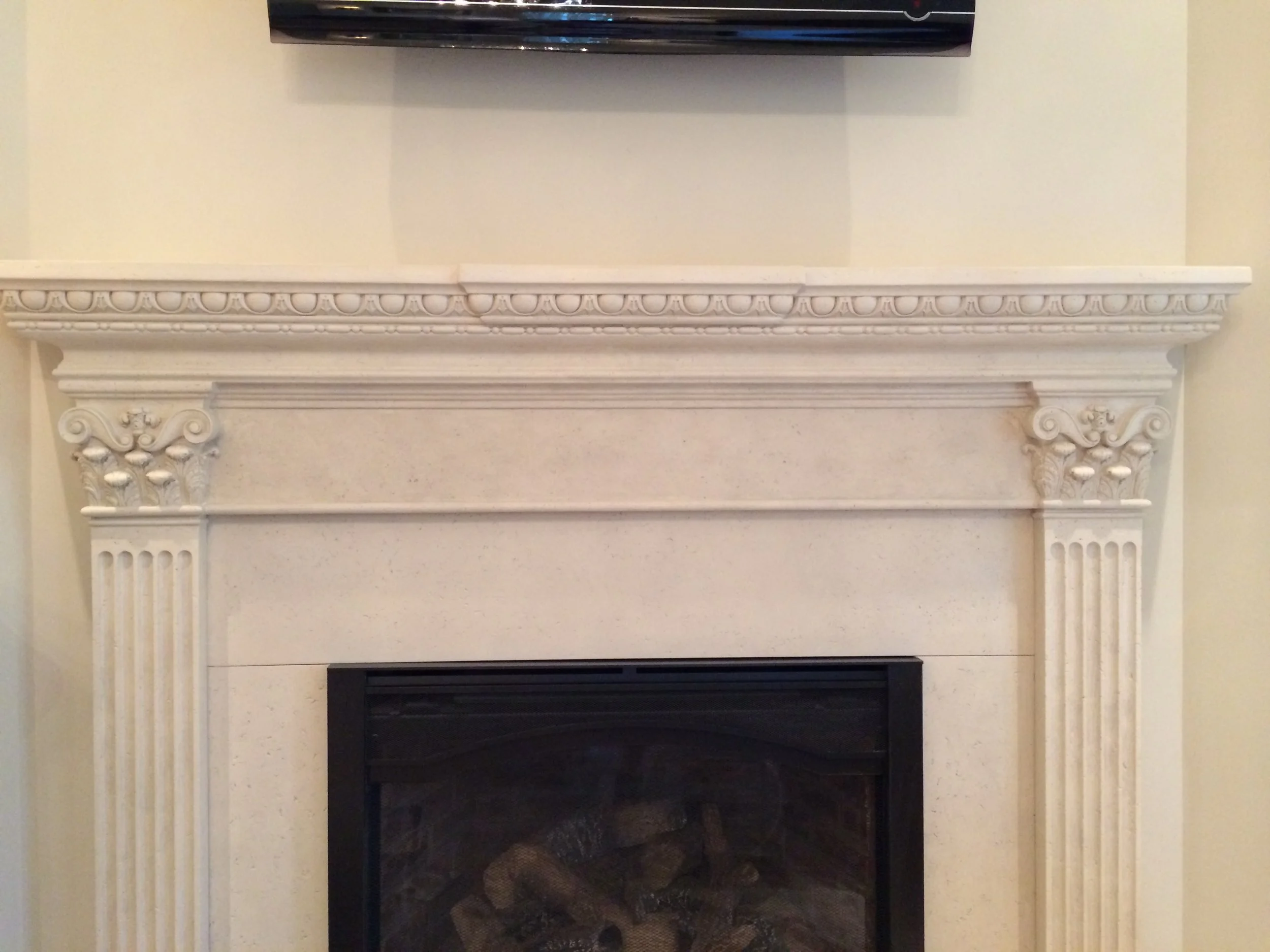 Residential fireplace finish by Custom Artisan Finishes in Omaha, Nebraska 