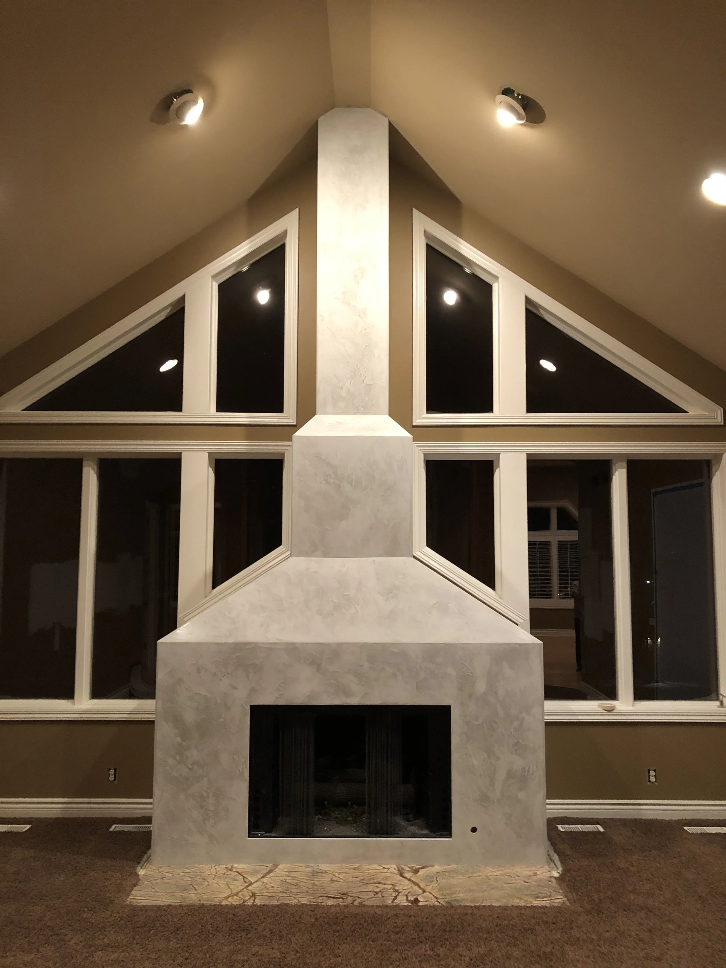 Residential fireplace finish by Custom Artisan Finishes in Omaha, Nebraska 