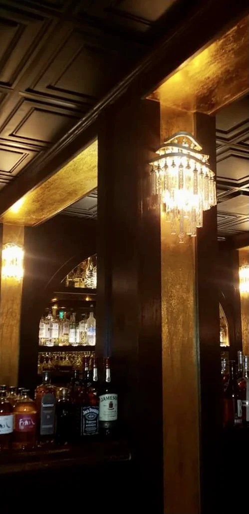 Wicked Rabbit and Alice Lounges commercial installation by Custom Artisan Finishes in Omaha, Nebraska. Commercial Restoration and Installation, gold leafing, gilding, masonry repair, by Custom Artisan Finishes in Omaha, Nebraska.