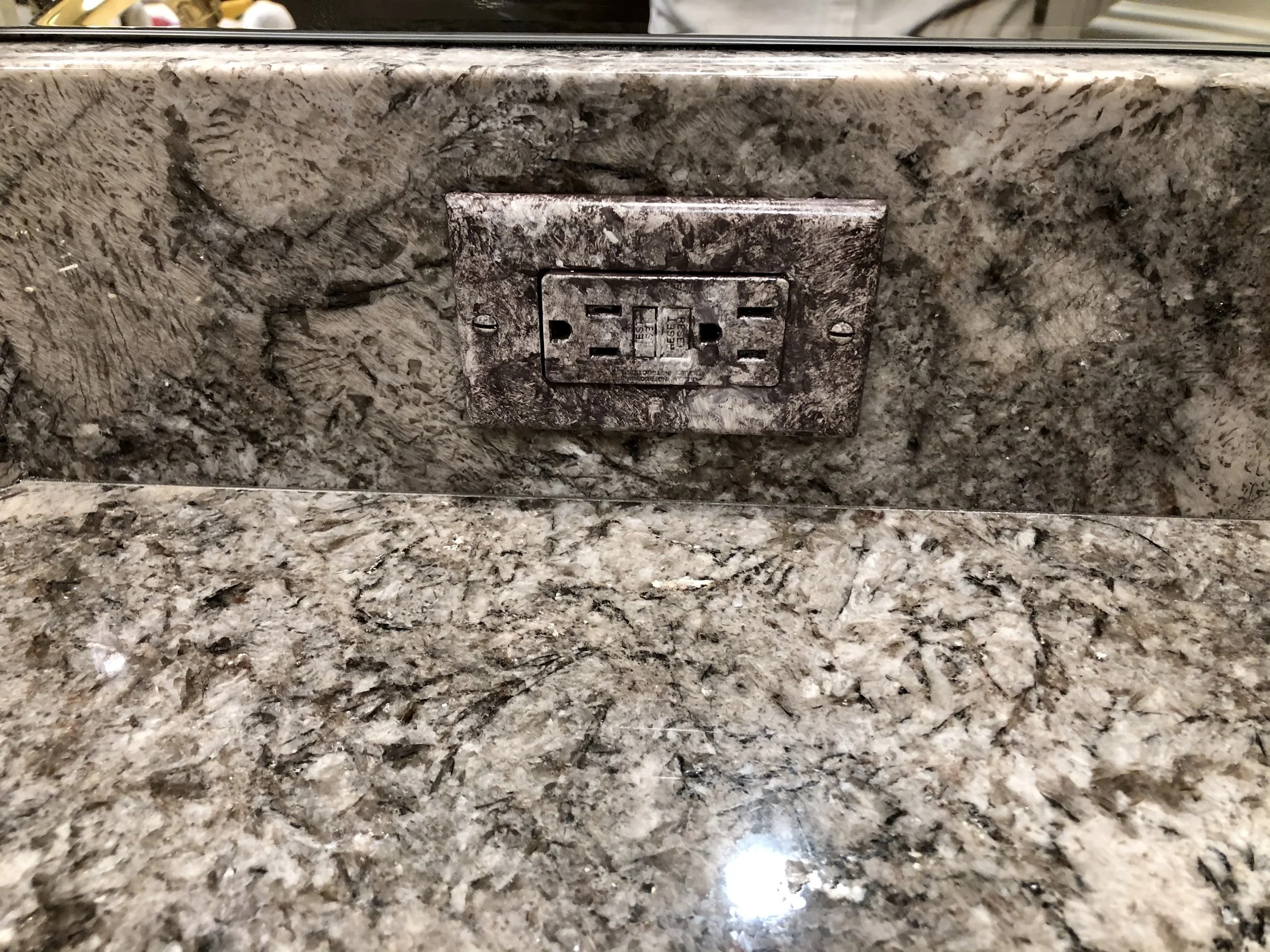 Hand Painted Outlet Covers by Custom Artisan Finishes 