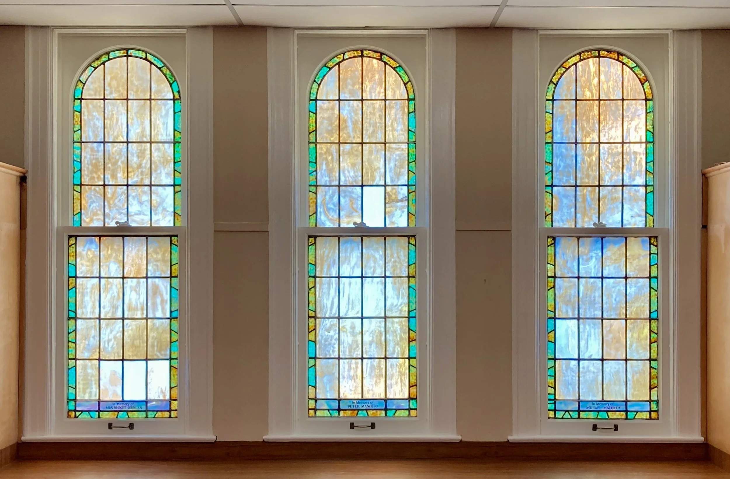 St. Francis stained glass window repair. Historical restoration by Custom Artisan Finishes in Omaha, Nebraska.