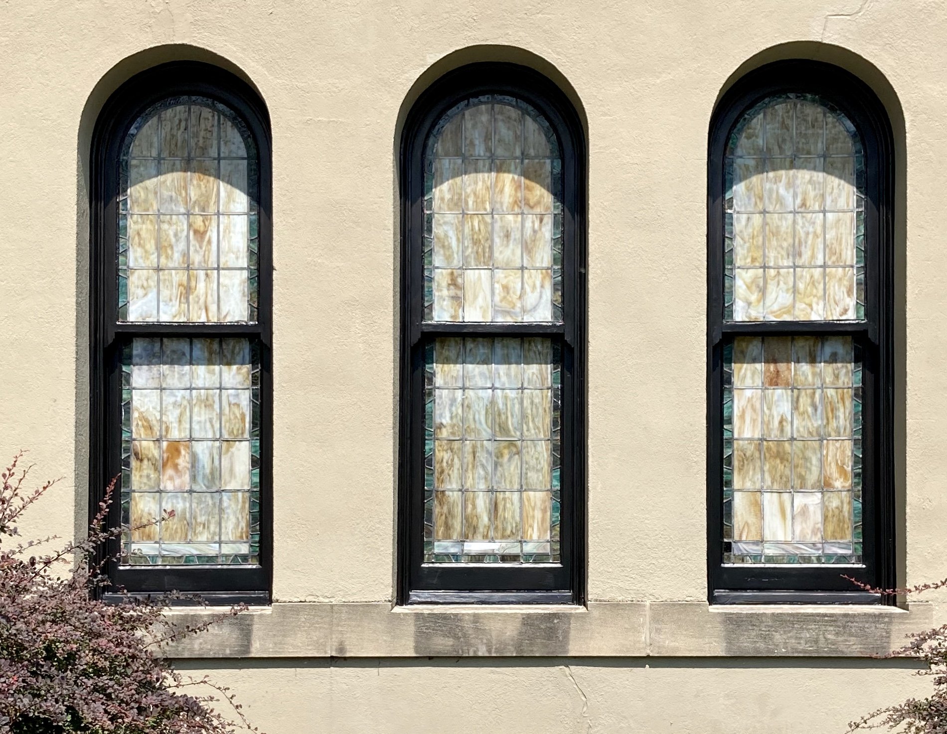 St. Francis stained glass window repair. Historical restoration by Custom Artisan Finishes in Omaha, Nebraska.