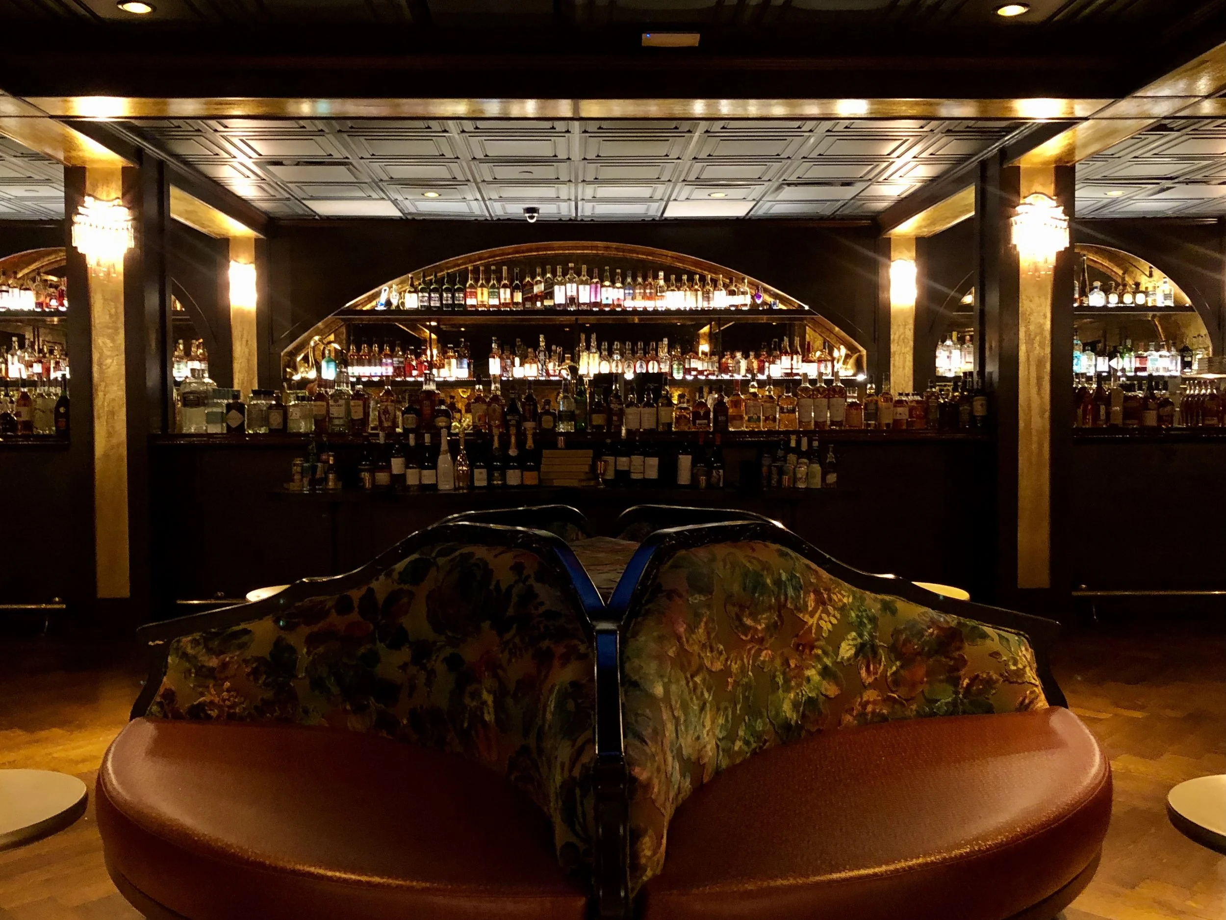 Wicked Rabbit and Alice Lounges commercial installation by Custom Artisan Finishes in Omaha, Nebraska. Commercial Restoration and Installation, gold leafing, gilding, masonry repair, by Custom Artisan Finishes in Omaha, Nebraska.