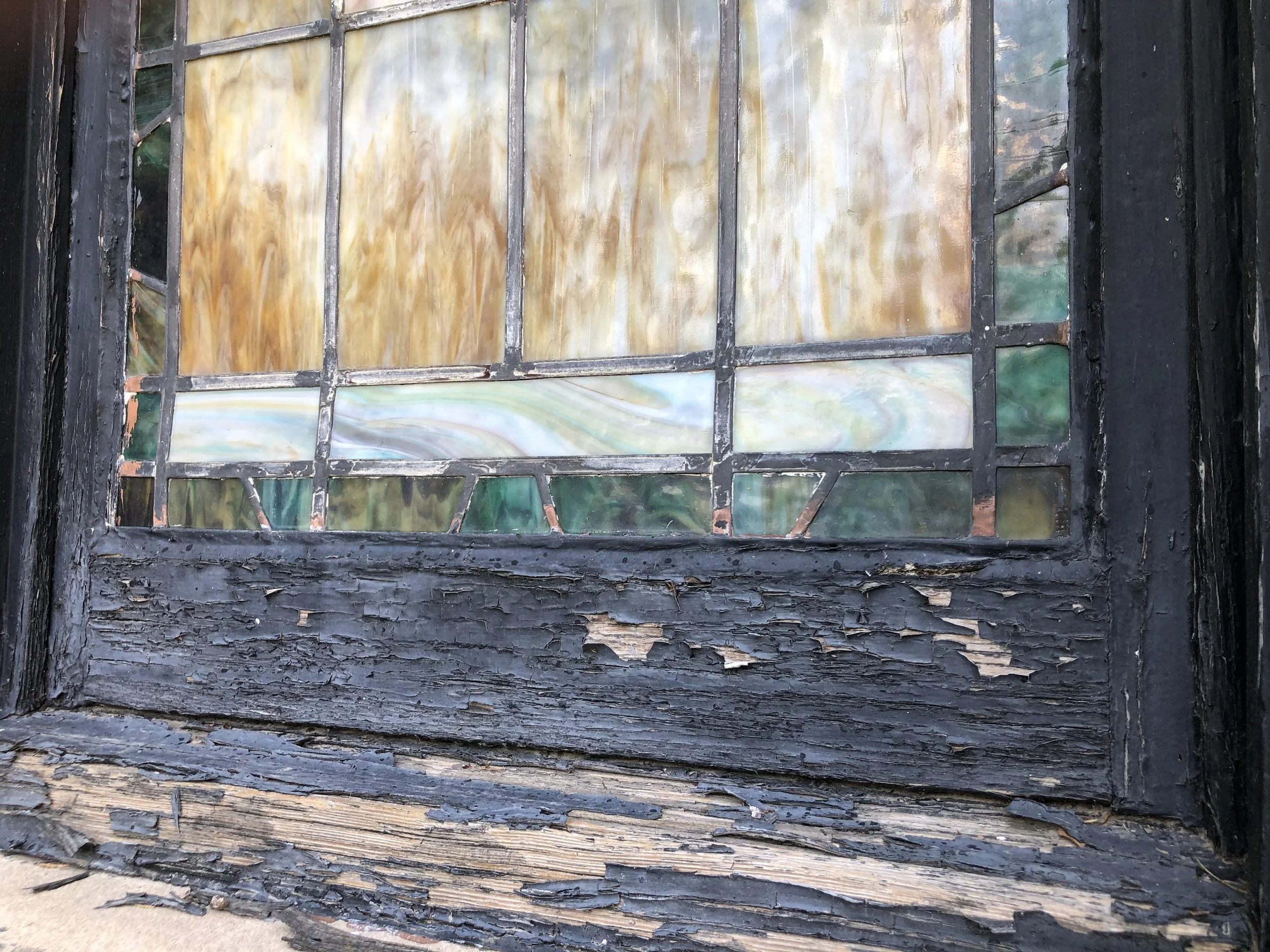 St. Francis stained glass window repair. Historical restoration by Custom Artisan Finishes in Omaha, Nebraska.