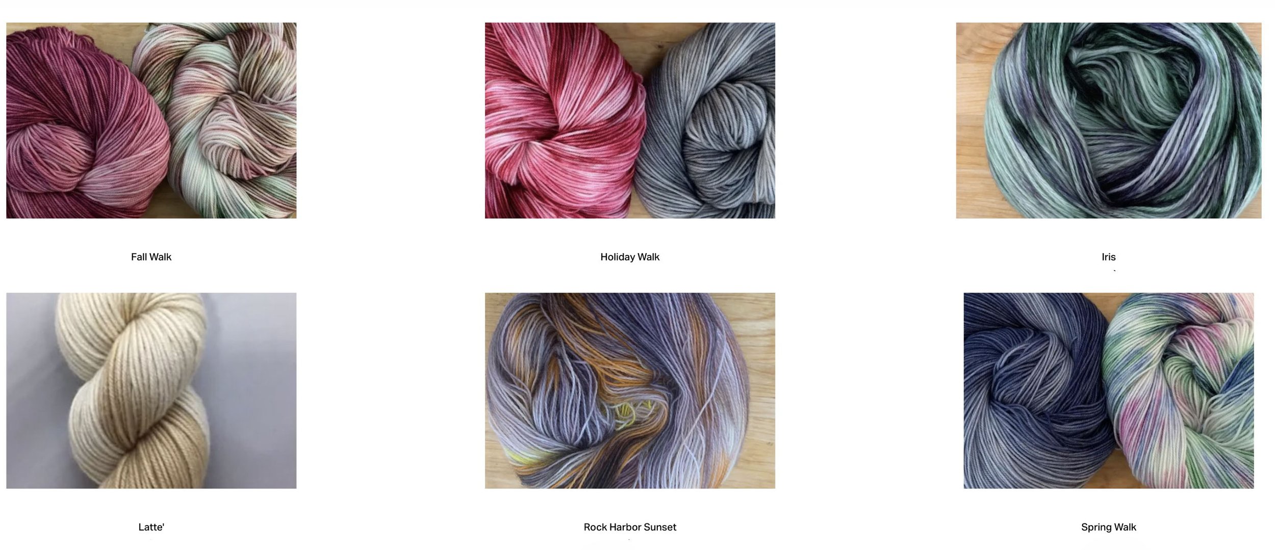 A collection of six balls of yarn in different colors and patterns, each labeled with a name. Top row left to right: Fall Walk, Holiday Walk, Iris. Bottom row left to right: Latte, Rock Harbor Sunset, Spring Walk.