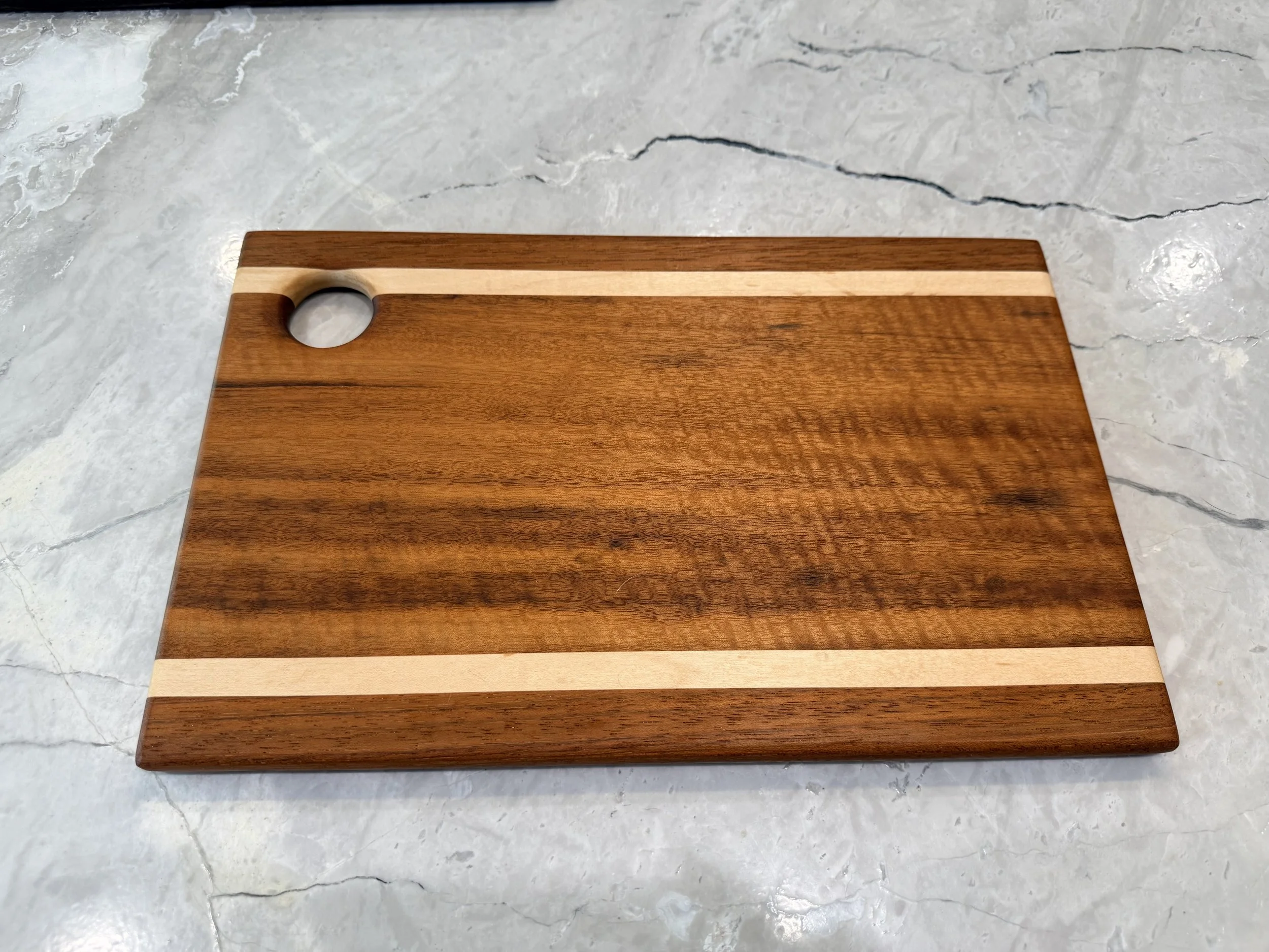 Product #: 122501

14 1/4" x 9 1/4" padauk, maple, and tiger wood serving tray.

$85