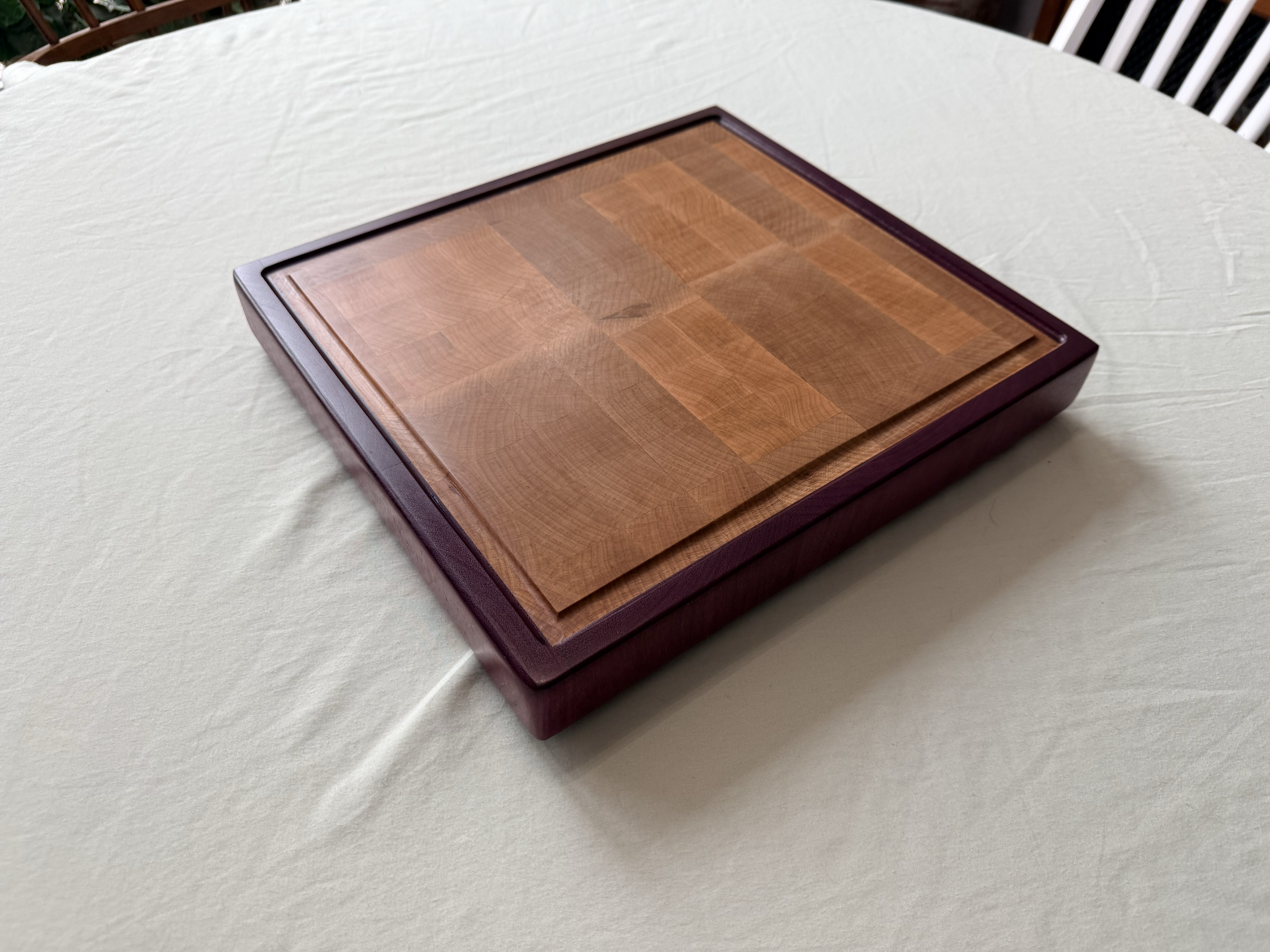 Product #: 112501

13 1/2 x 12 1/2 maple and purple heart end grain cutting board.

$150