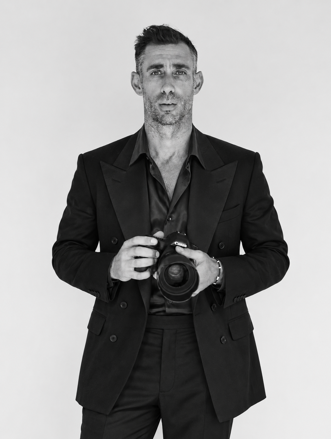 Michael Scott Slosar holding a camera