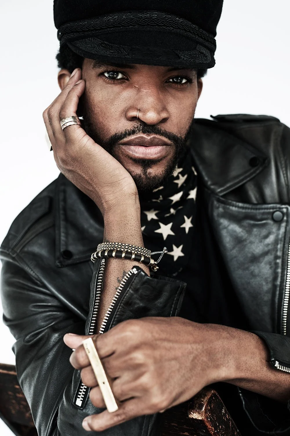 Portrait in a black cap and leather jacket