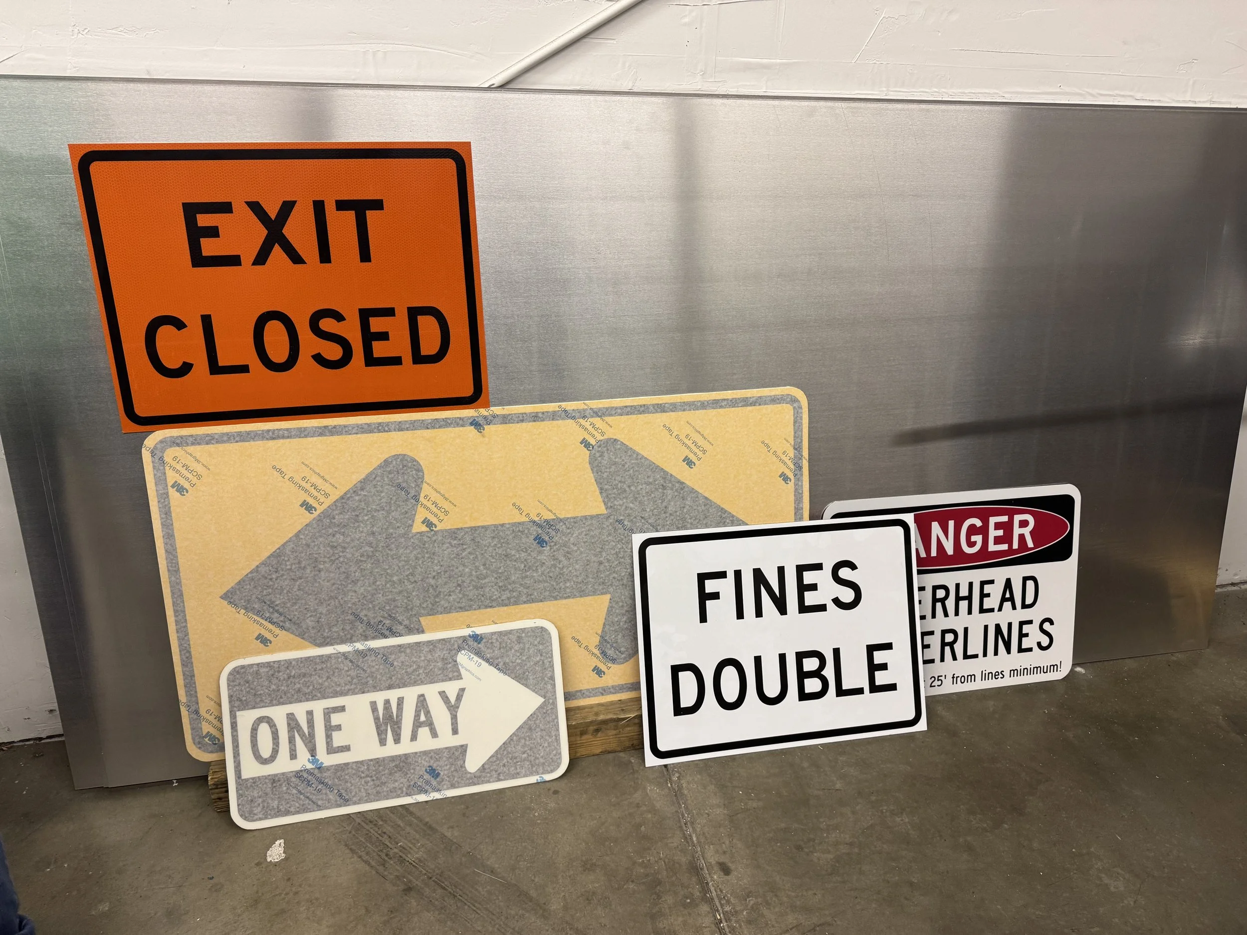 A collection of MUTCD signs printed by 1st Vanguard.jpeg