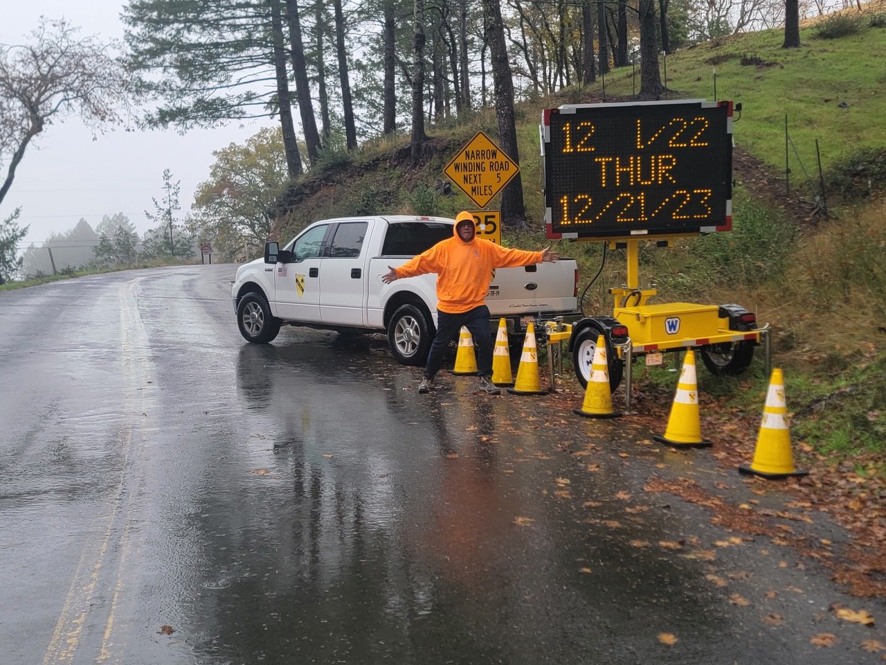 Delivering and setup of a message board and safety cones.jpeg