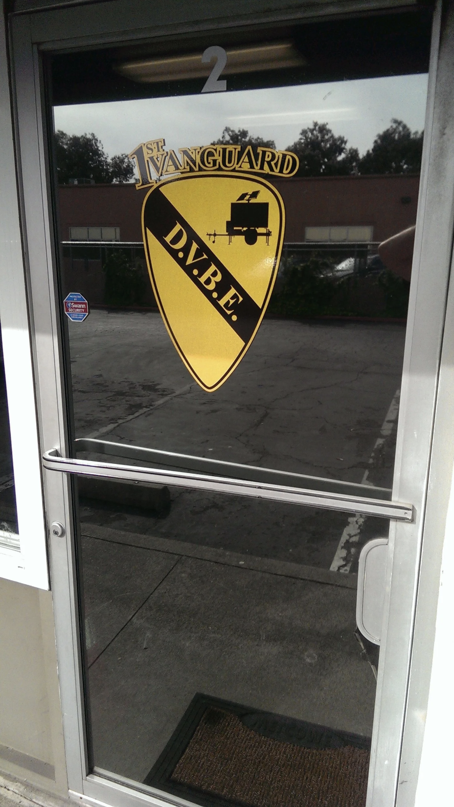 1st Vanguard Office Door.png
