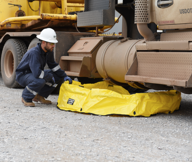 Pop-up haz mat pool under a fuel tank.webp