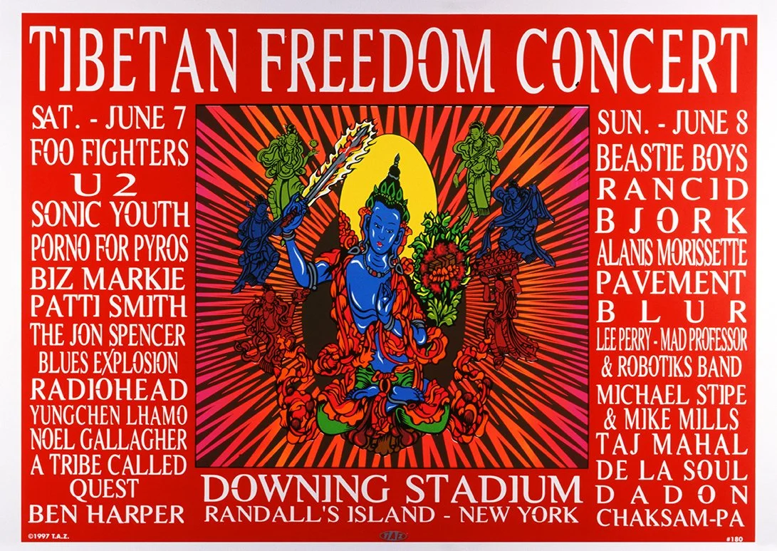 Poster for the Tibetan Freedom Concert featuring a colorful illustration of a deity with blue skin, surrounded by smaller figures, and event details on a red background.