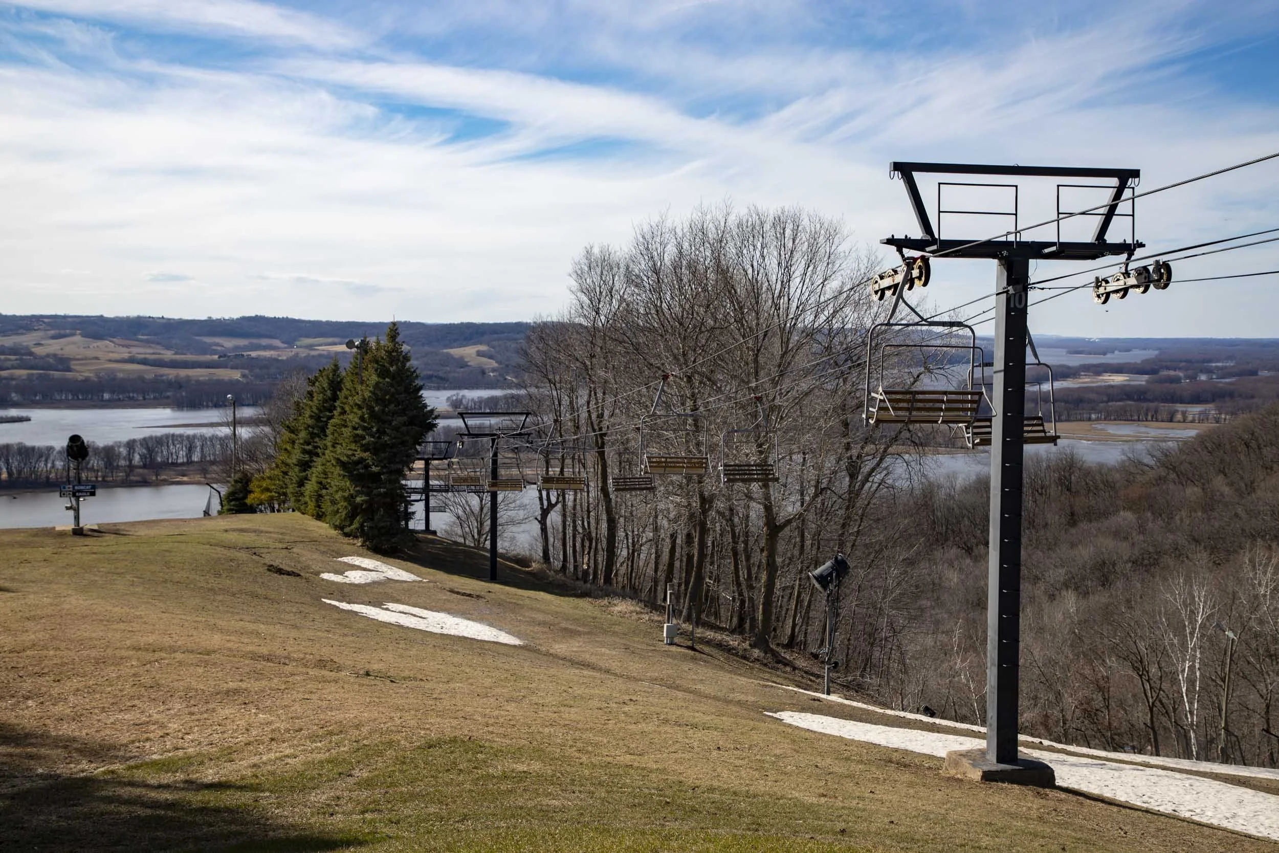 Ski lift at Chestnut Resort with the Mississippi River in the background.