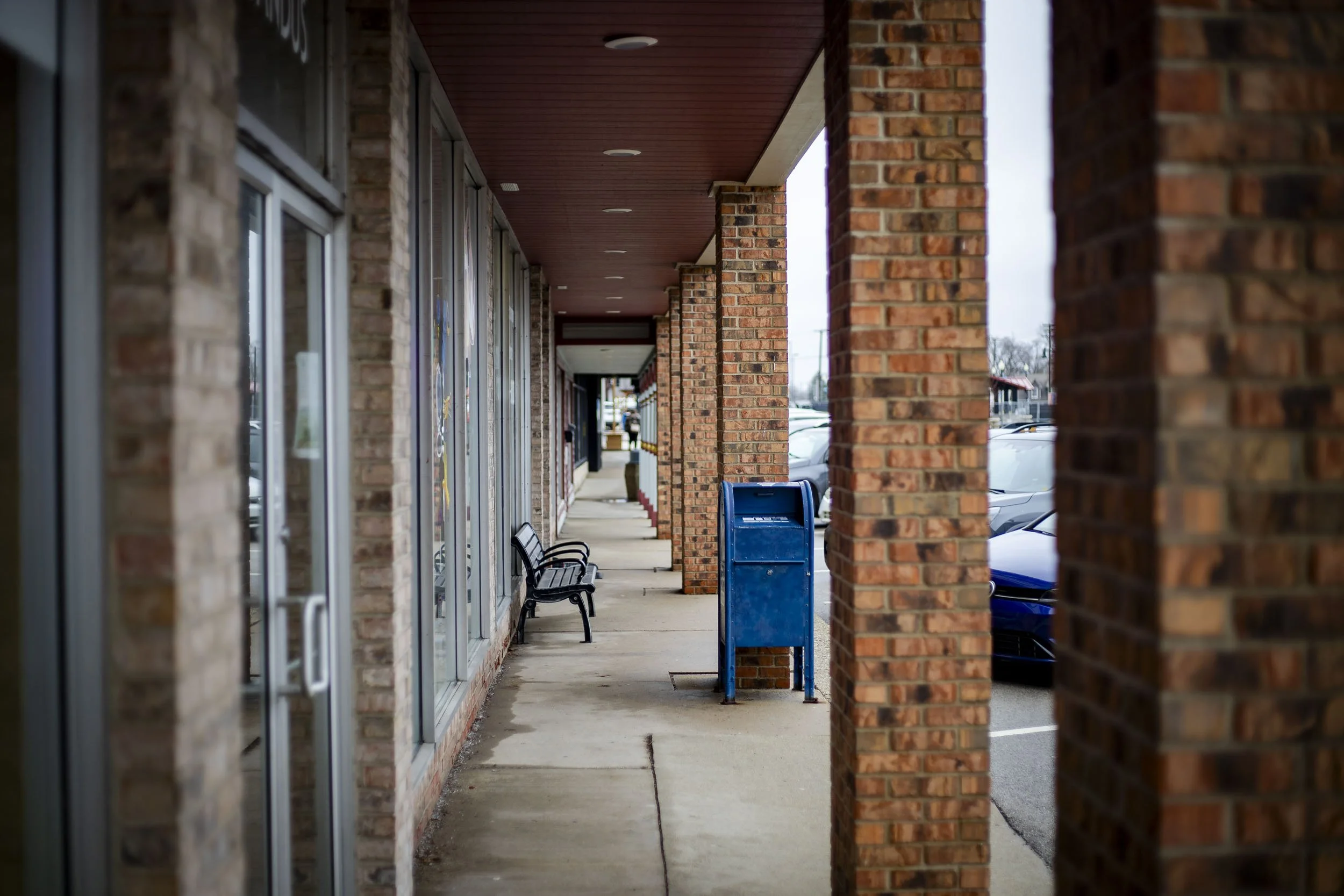 The shopping block corridor on the east side of the center.  (2026)
