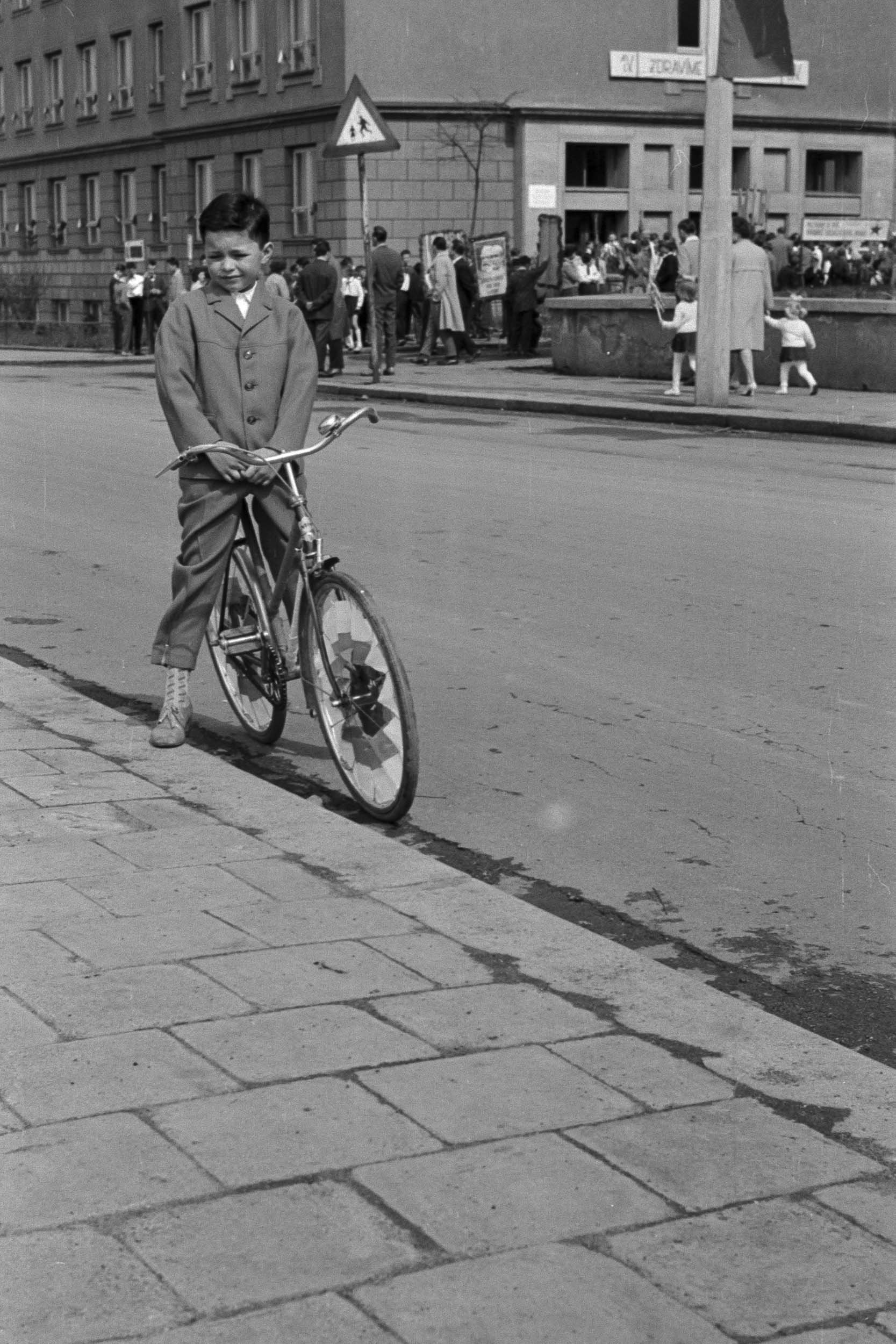 Boy and bicycle on the street