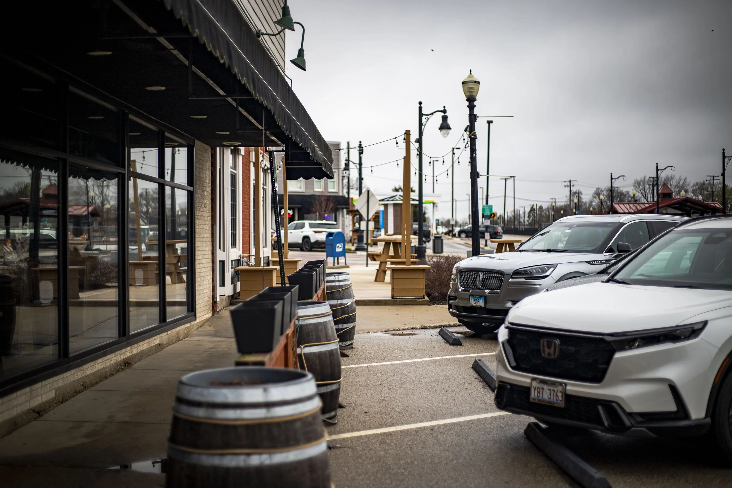 Barrels tempting to an Italian restaurant in the city center.  (2026)