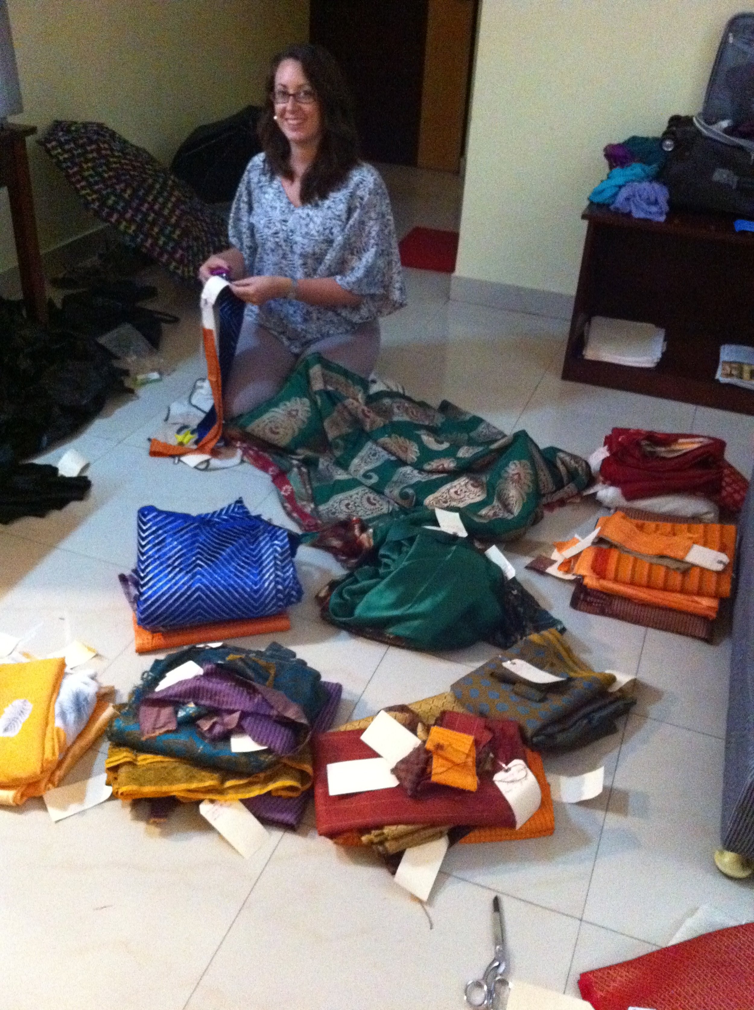 Cathy Parrott organizing fabrics in Kolkata, India