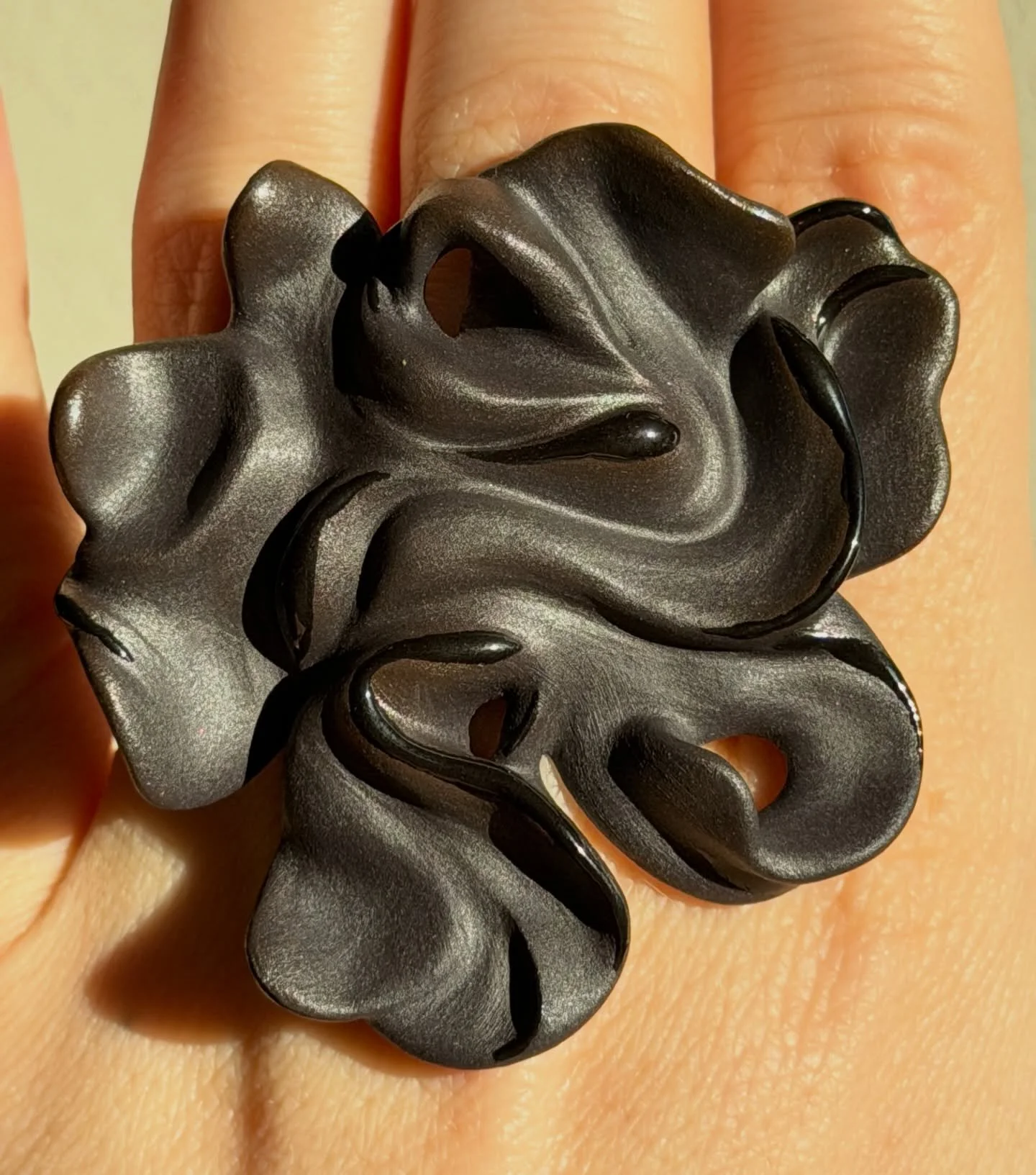 Wearable sculpture.
This ring is for sale. It has an inner diameter of 18.2 mm, so the corresponding European ring size is 57. The price is &euro;150.

This ring is made of:
&bull; curiosity &mdash; the need to see what my hands can do, and where I e