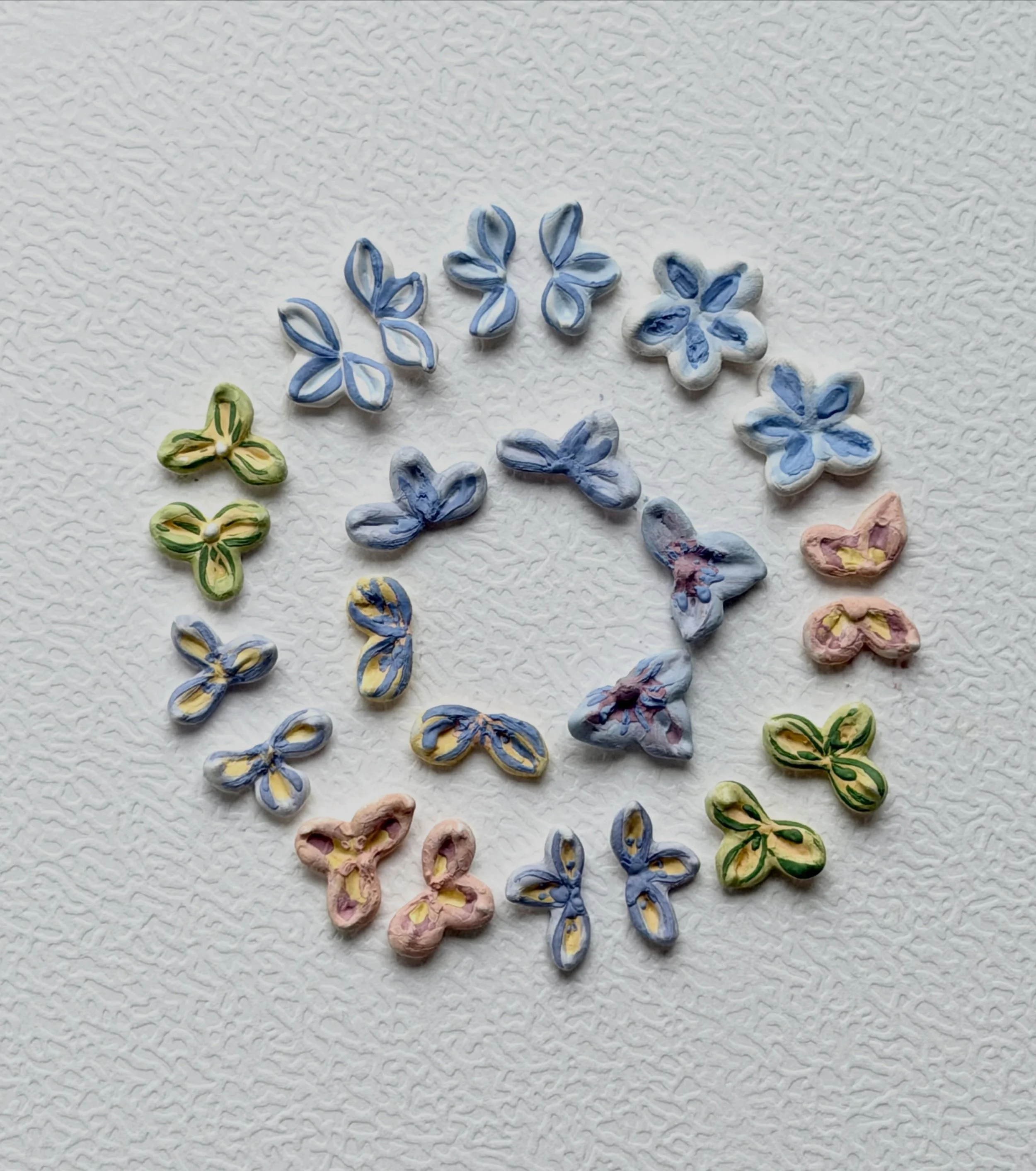 I think this summer put me in a color phase. I&rsquo;ve looked at so many flowers, so many color combinations, and now I just want to bring more of that into what I make.

So I&rsquo;m still working on these tiny earrings, painting them one by one an
