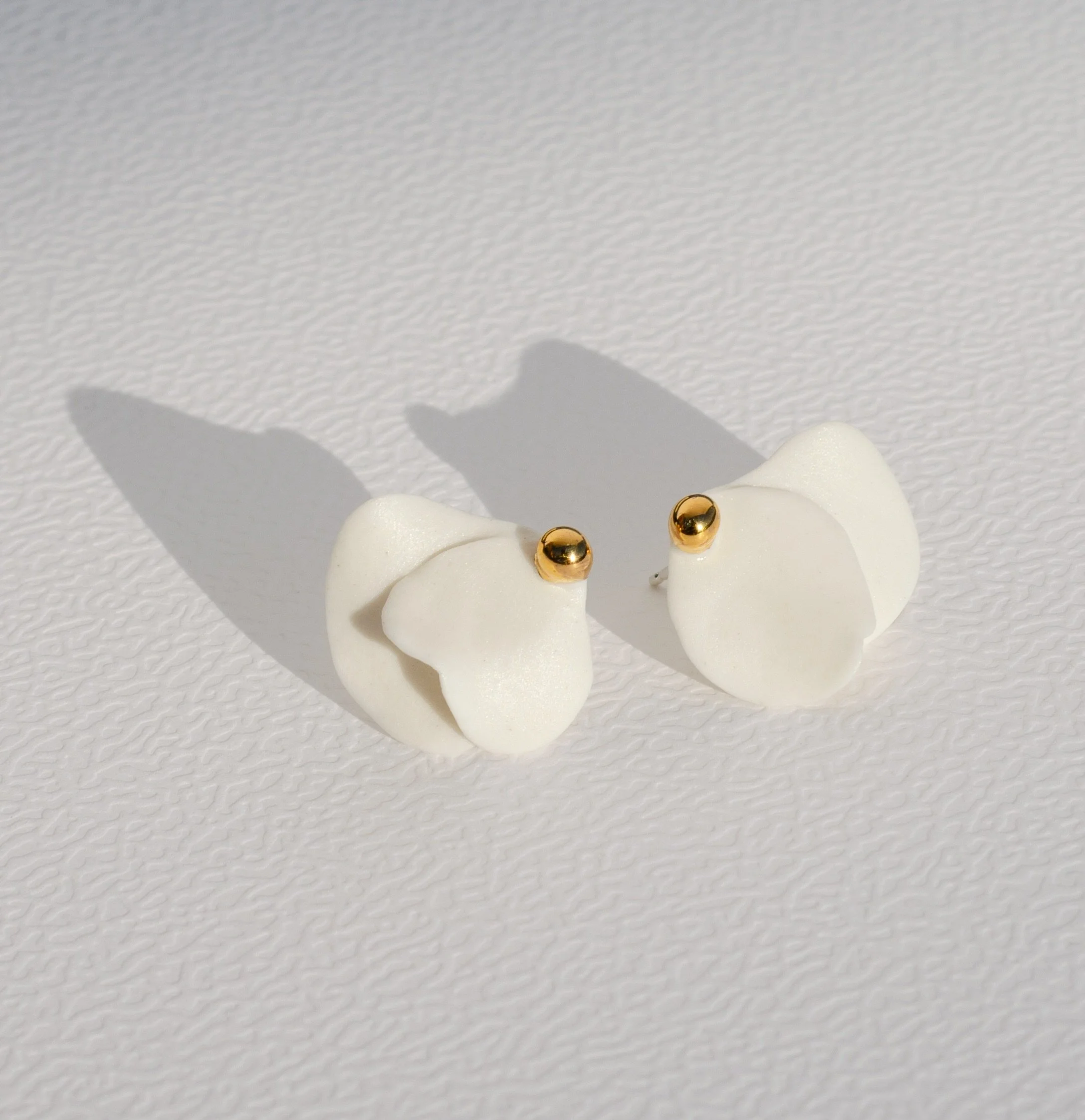 These are one of the pairs of earrings I get asked about the most, and one of my favorite designs I&rsquo;ve made. This pair sold a while ago, so I&rsquo;m making a few new ones.

Same design, but each pair will have its own shape.