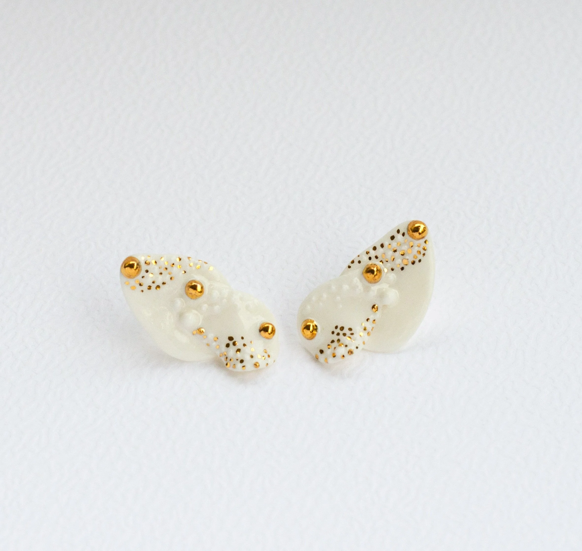 I was thinking about petals caught by the wind when I made these earrings. How they just let go and let the wind take them wherever it wants.

There&rsquo;s something beautiful in that.

Let Go 
Available on raiars.com
Entirely hand-carved in porcela