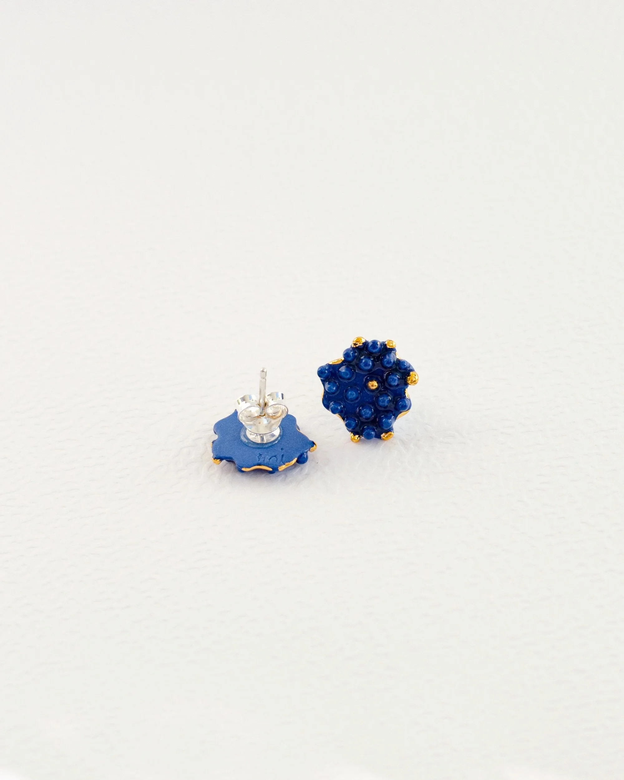 Going places, seeing people, doing things, living a little more. These little ones are very much up for all of it. 

Buzzing earrings 
Available on raiars.com 

Hand-carved from blue porcelain &middot; 24k gold accents &middot; Sterling silver posts
