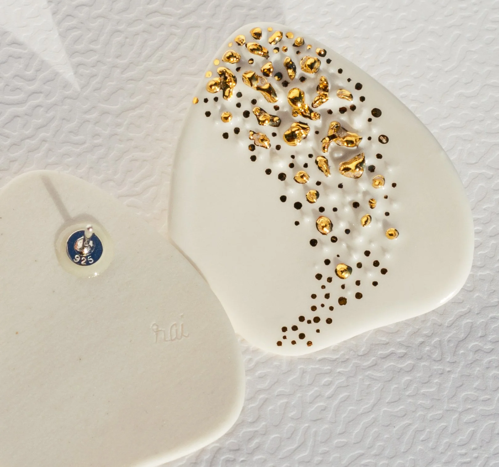 Handmade porcelain earrings with 24k gold details, fitted with 925 sterling silver posts and butterfly backs.