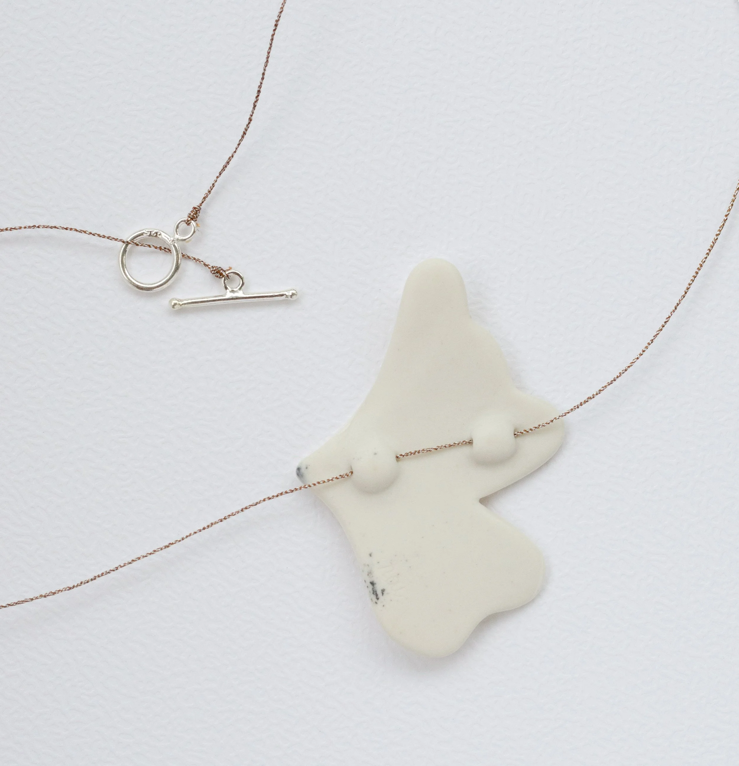 ease-porcelain-necklace-4.jpg