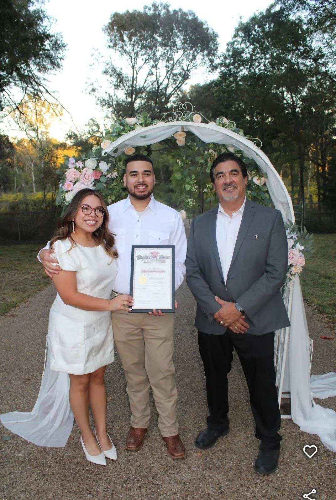 Couple at a personal ranch joining in unity of marriage in personal intimate ceremony.
