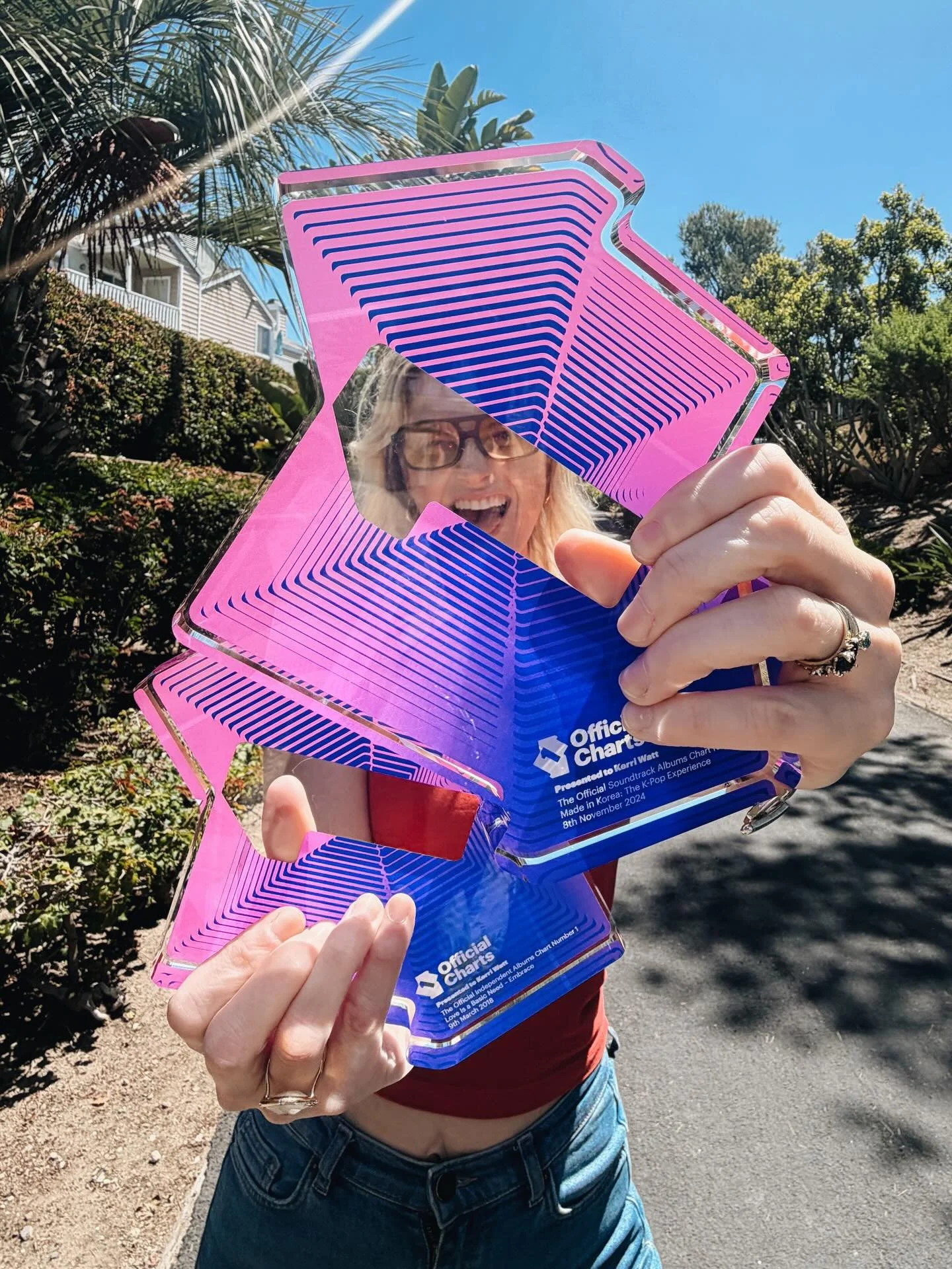 Delivery! So cool to be presented with these awards by @officialcharts for my contribution to two No.1 records and a top 10 album. Always dreamed of getting my hands on one of these and now I have 3! Took them on an outing to the beach to celebrate. 
