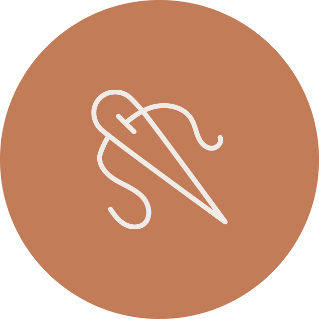 Icon of a sewing needle and thread on a brown circular background.