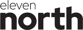 Text that reads 'eleven north' in black font on a white background.