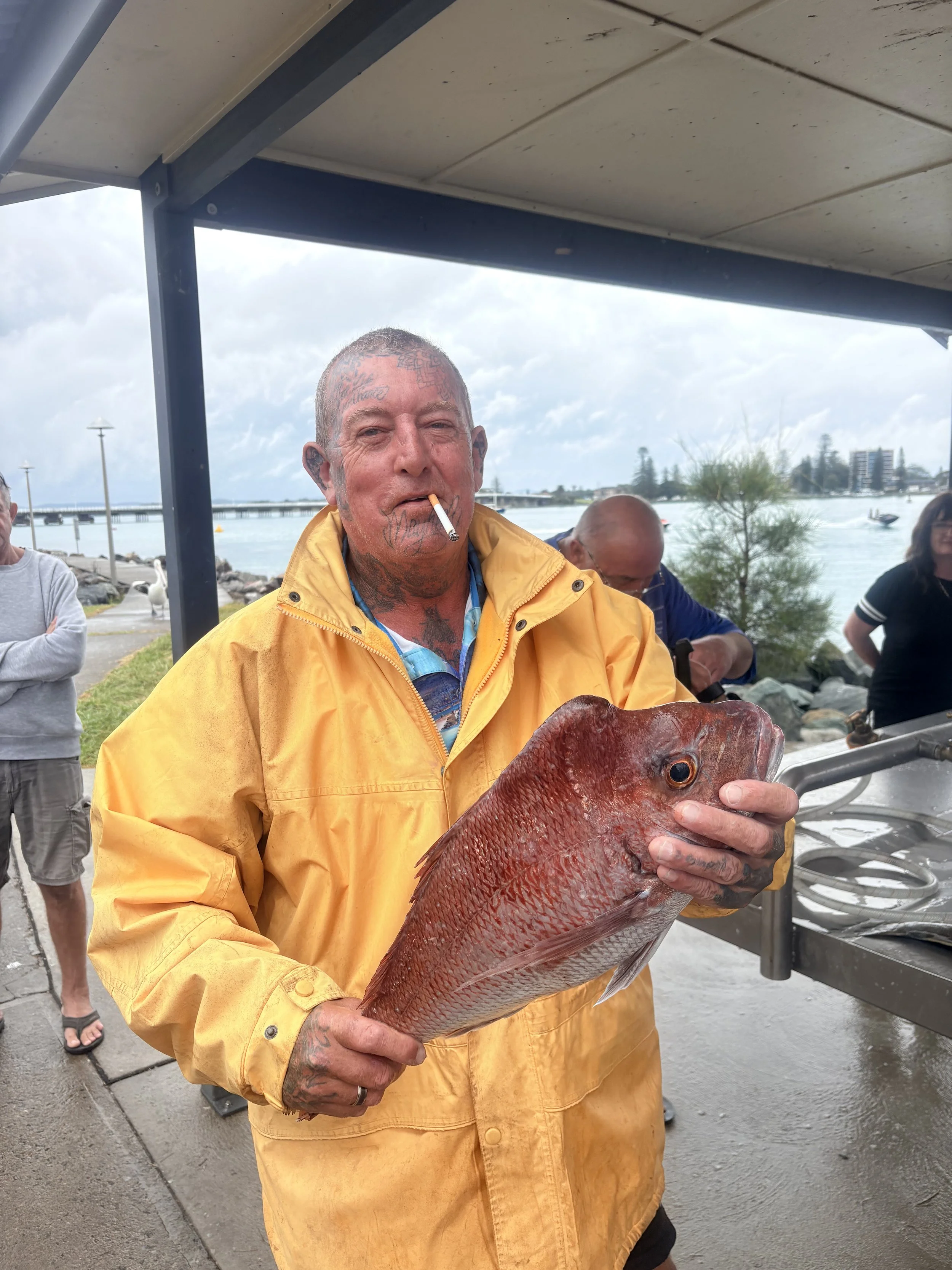 Alan McAlpine with his winning snapper.jpeg