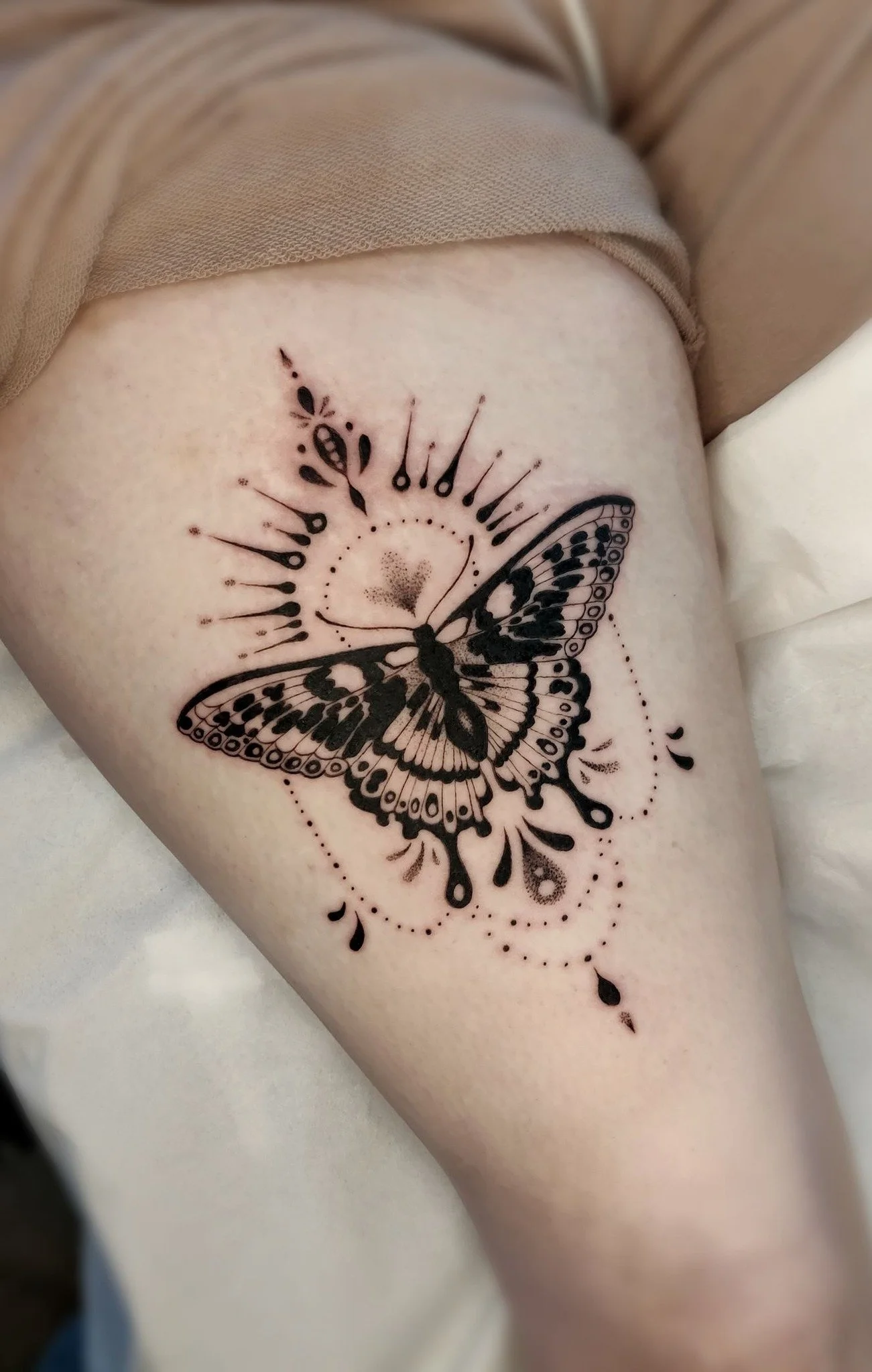 Black butterfly/moth tattoo
