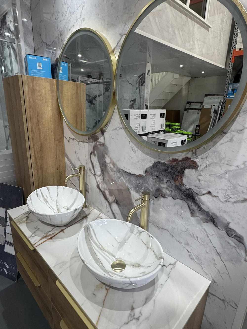 Bathroom showroom display at A K Plastic and Plumbing Materials