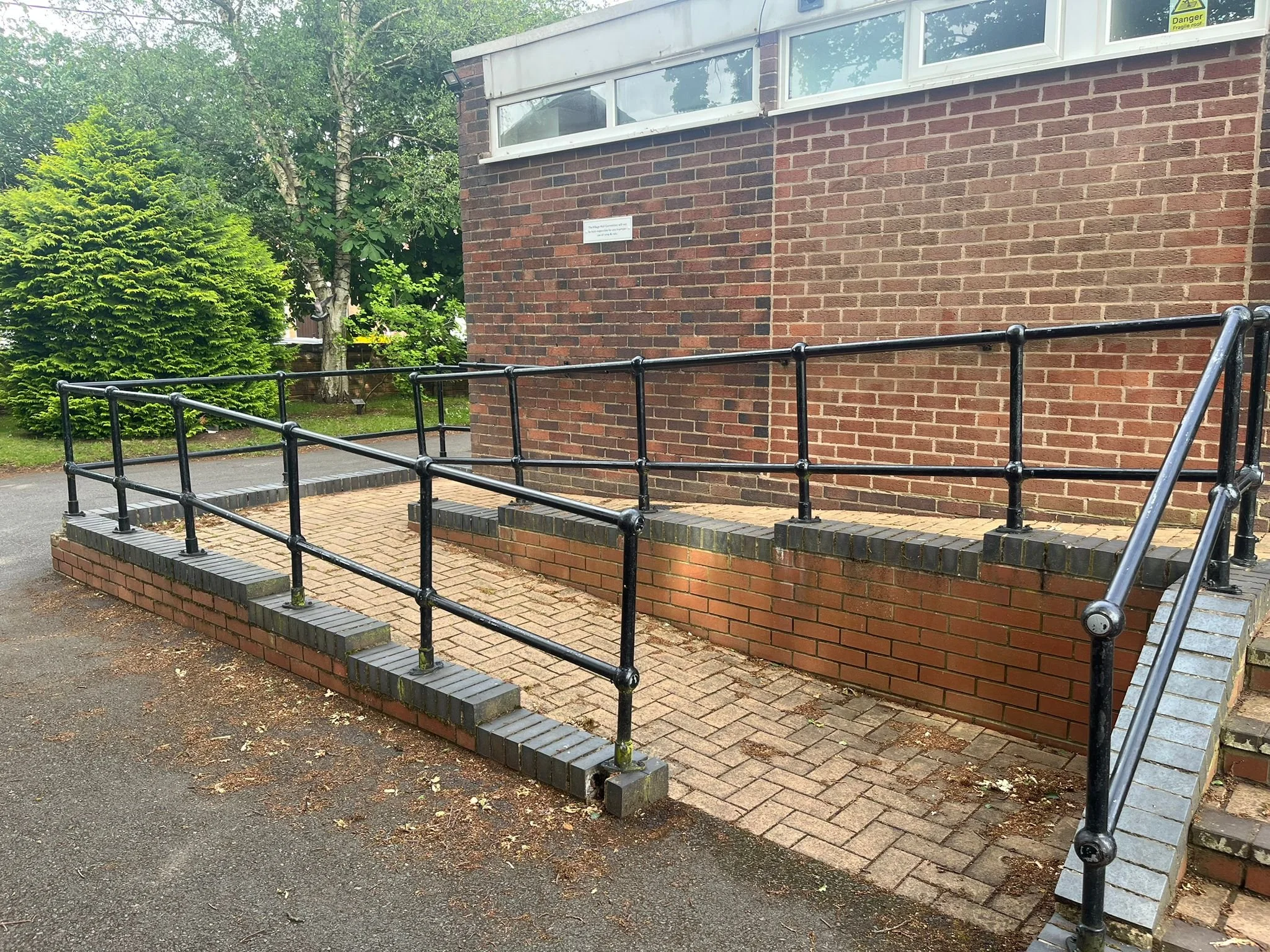 Disability Ramp for ease of access, located next to the main doors adjacent to main carpark
