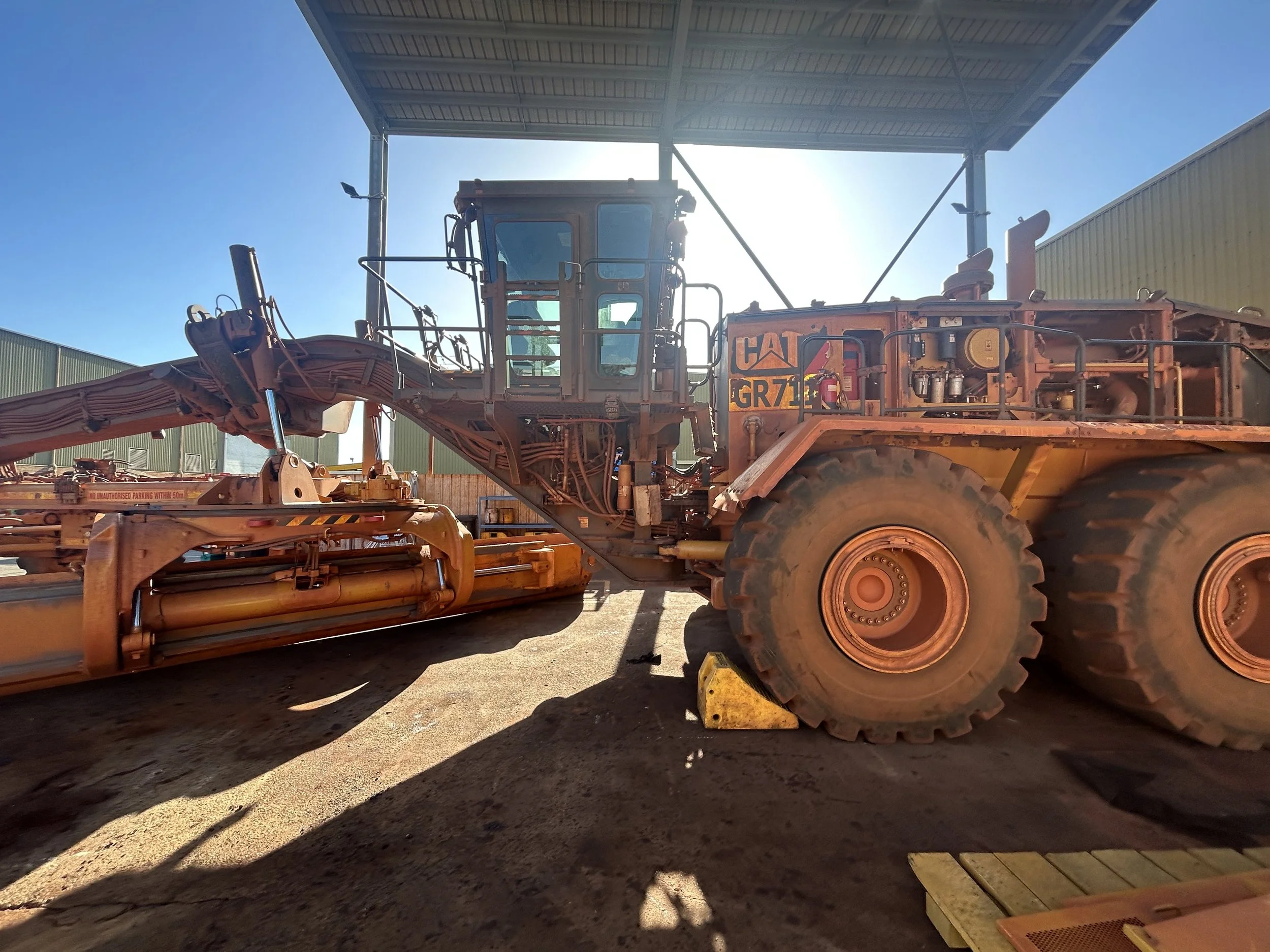 24M CAT Grader side view (Before).jpg