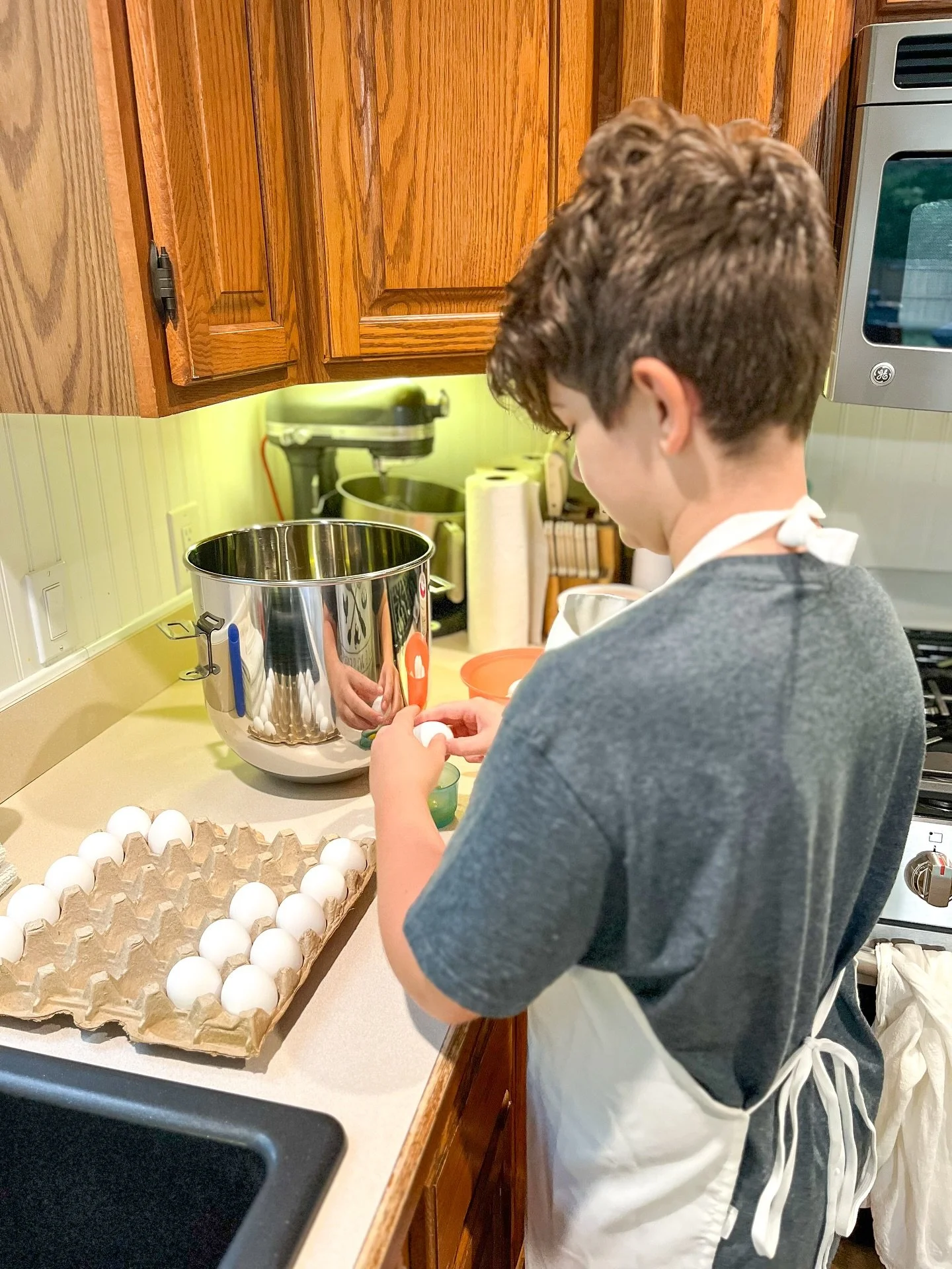 My BESTEST helper is in the kitchen with me today! He can crack eggs, measure, scoop and bake with precision and has a great attitude, to boot. 🥚