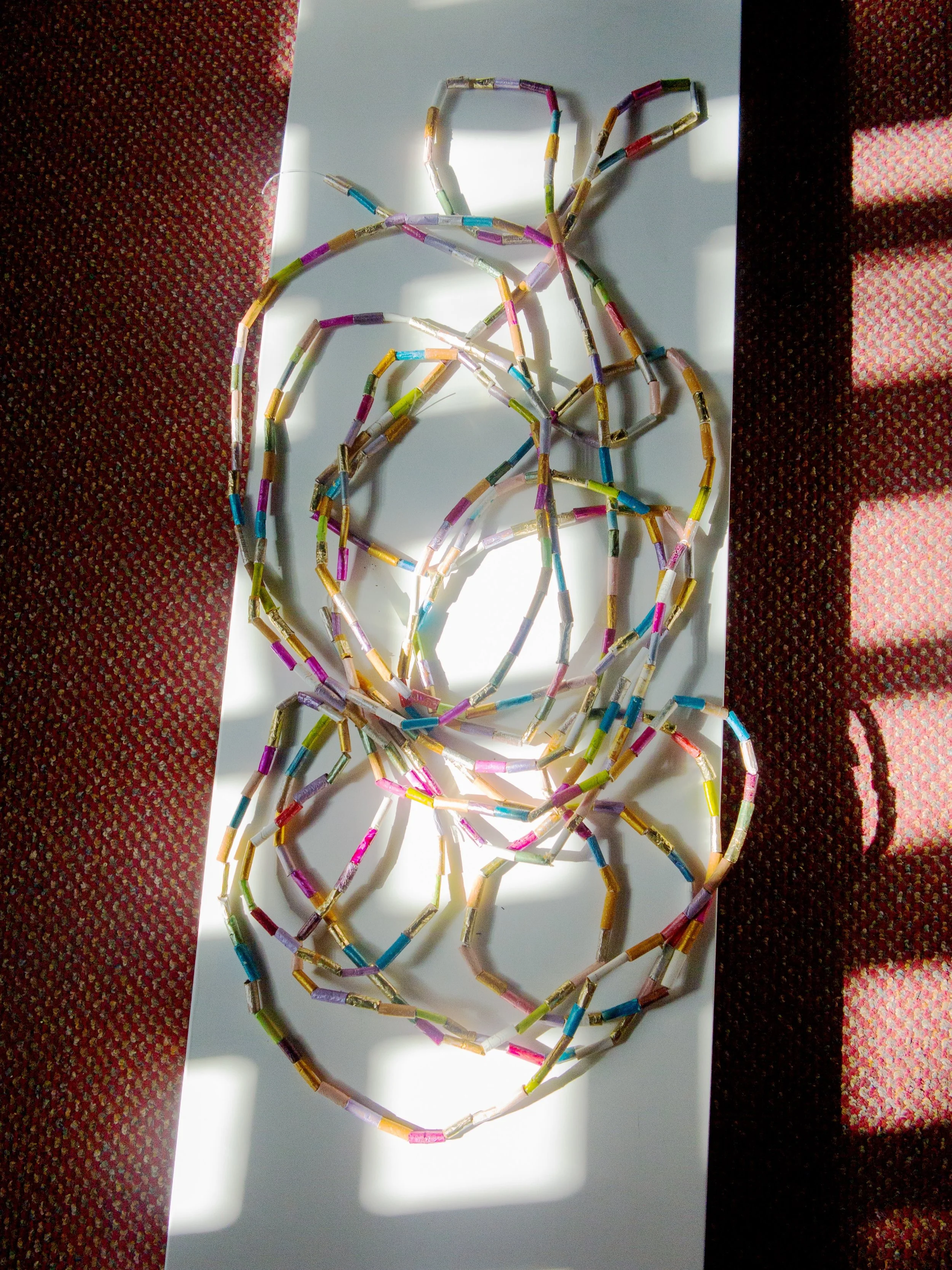 Photos documenting the installation of MIXED FEELINGS exhibition, last November at Auberge de France on Island of Rhodes, Greece 

- Fire Necklace , necklace made of cigarette beads 

- Dama Dama Tear , bottom part of the sculpture 

- The Forest to 