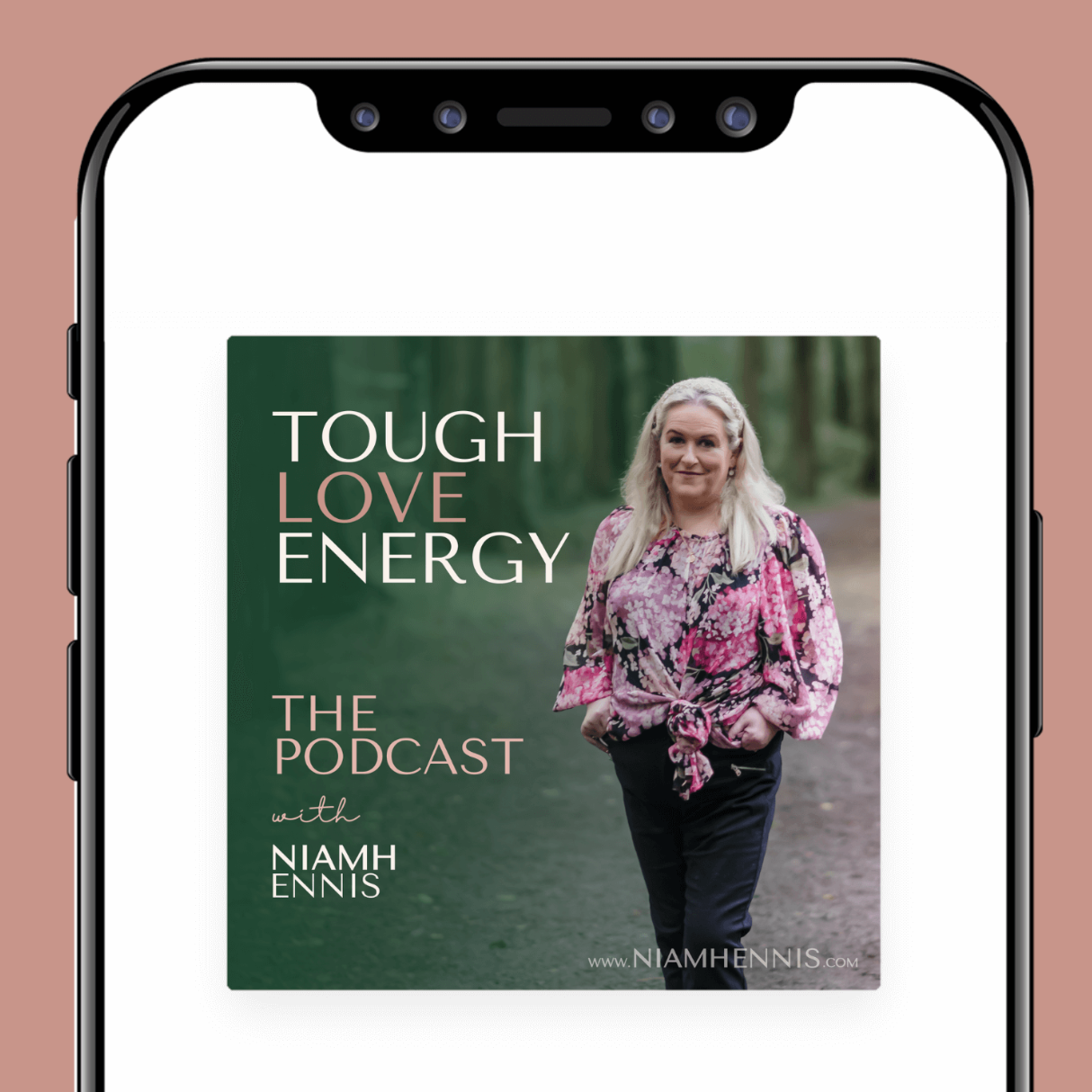 Cover image for the podcast 'Tough Love Energy' featuring Niamh Ennis, with a photo of a woman with blonde hair wearing a pink floral top and black pants, standing outdoors in a green forested area.