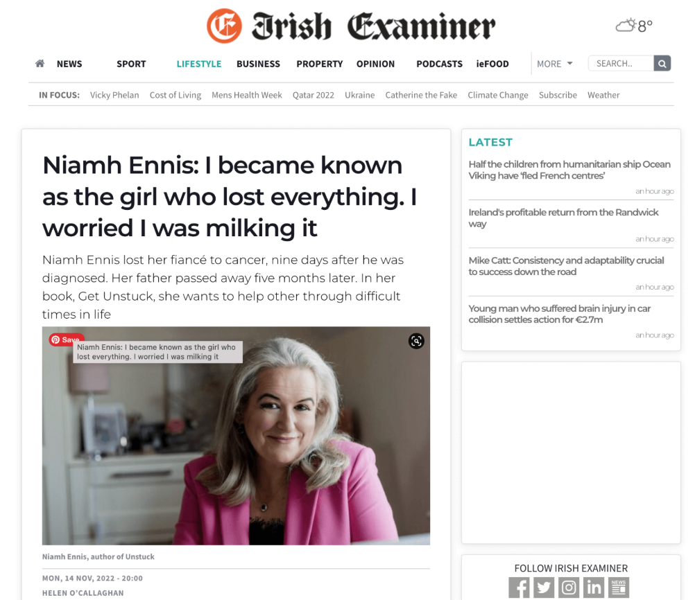 Screenshot of the Irish Examiner news website featuring an article about Niamh Ennis, with a photo of a woman with gray hair wearing a pink blazer.