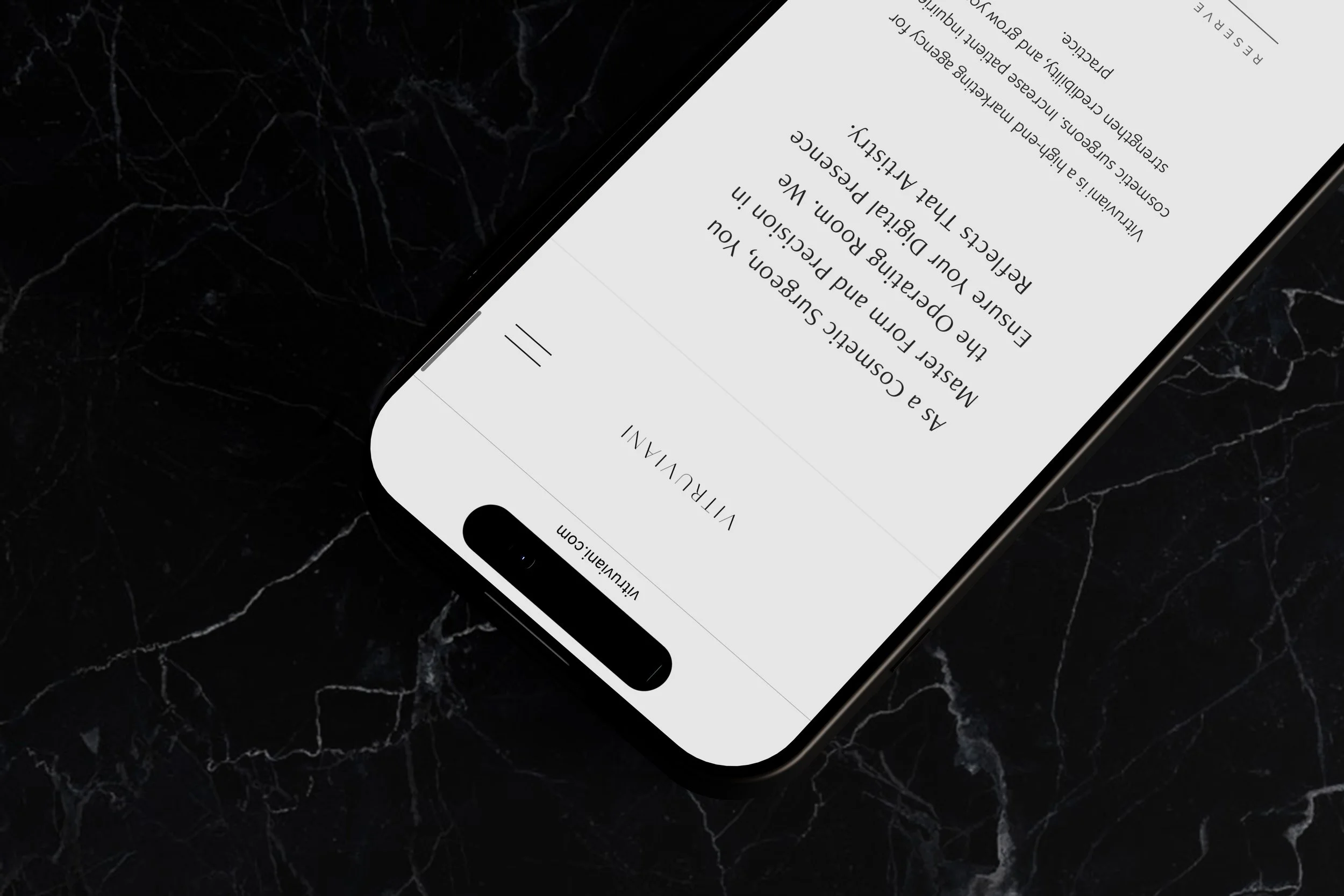 The typographic system combines a sculptural serif for statements with a rational sans-serif for supporting information.